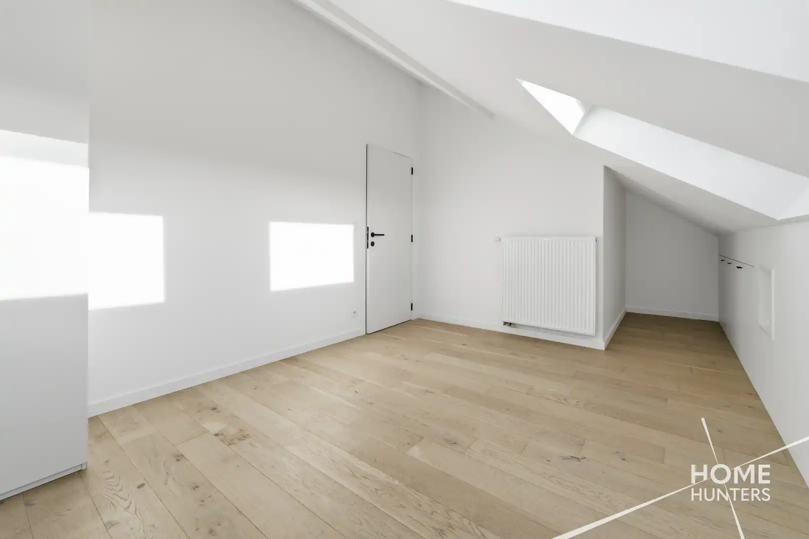 Ruim dakappartement met royaal terras en een schitterend uitzicht over Ieper foto 12