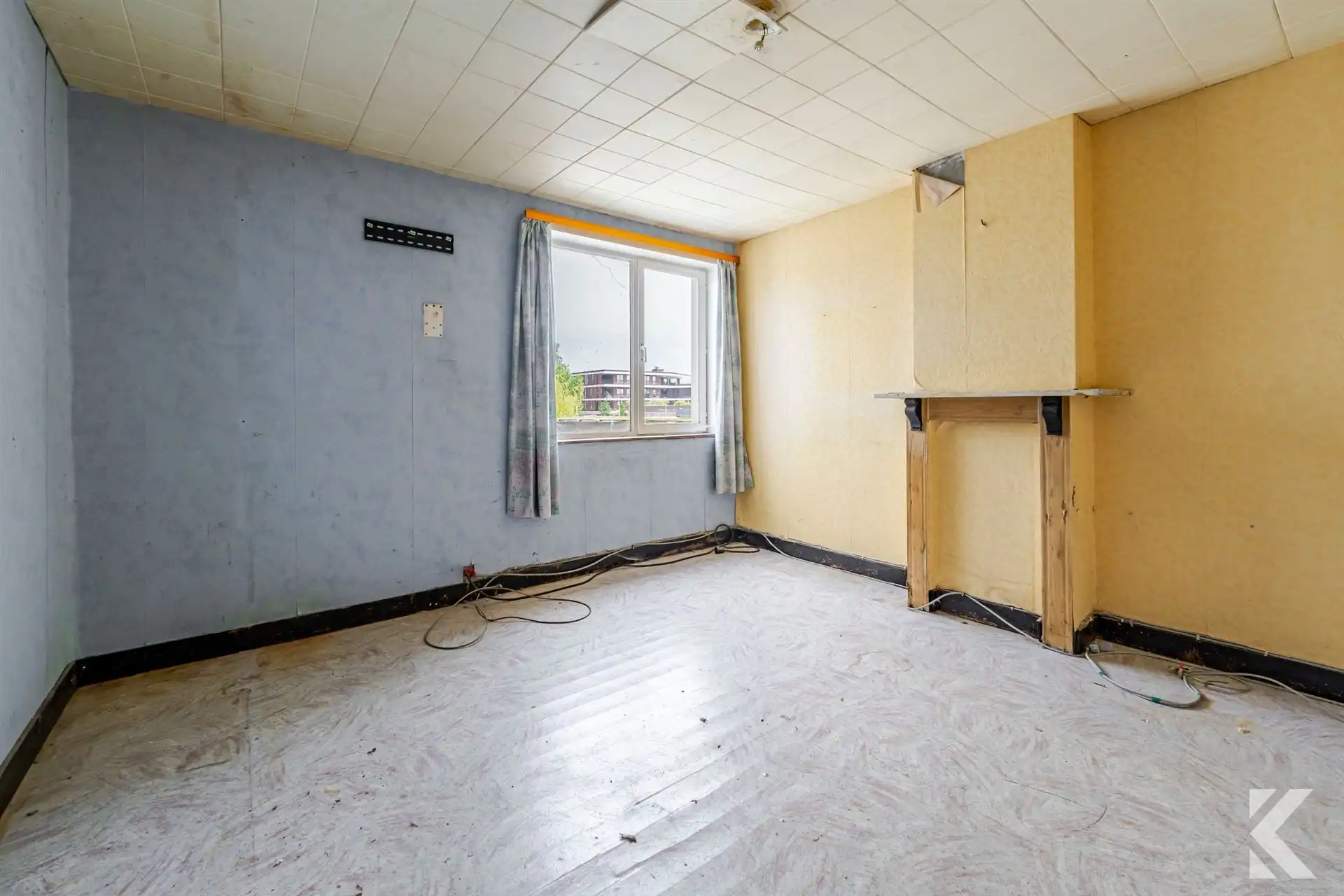 Te renoveren woning met veel potentieel en ruime zolder foto 12