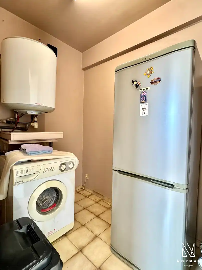 Instapklaar 2-slaapkamer appartement inclusief autostaanplaats en terras te koop in Kuurne! foto 7
