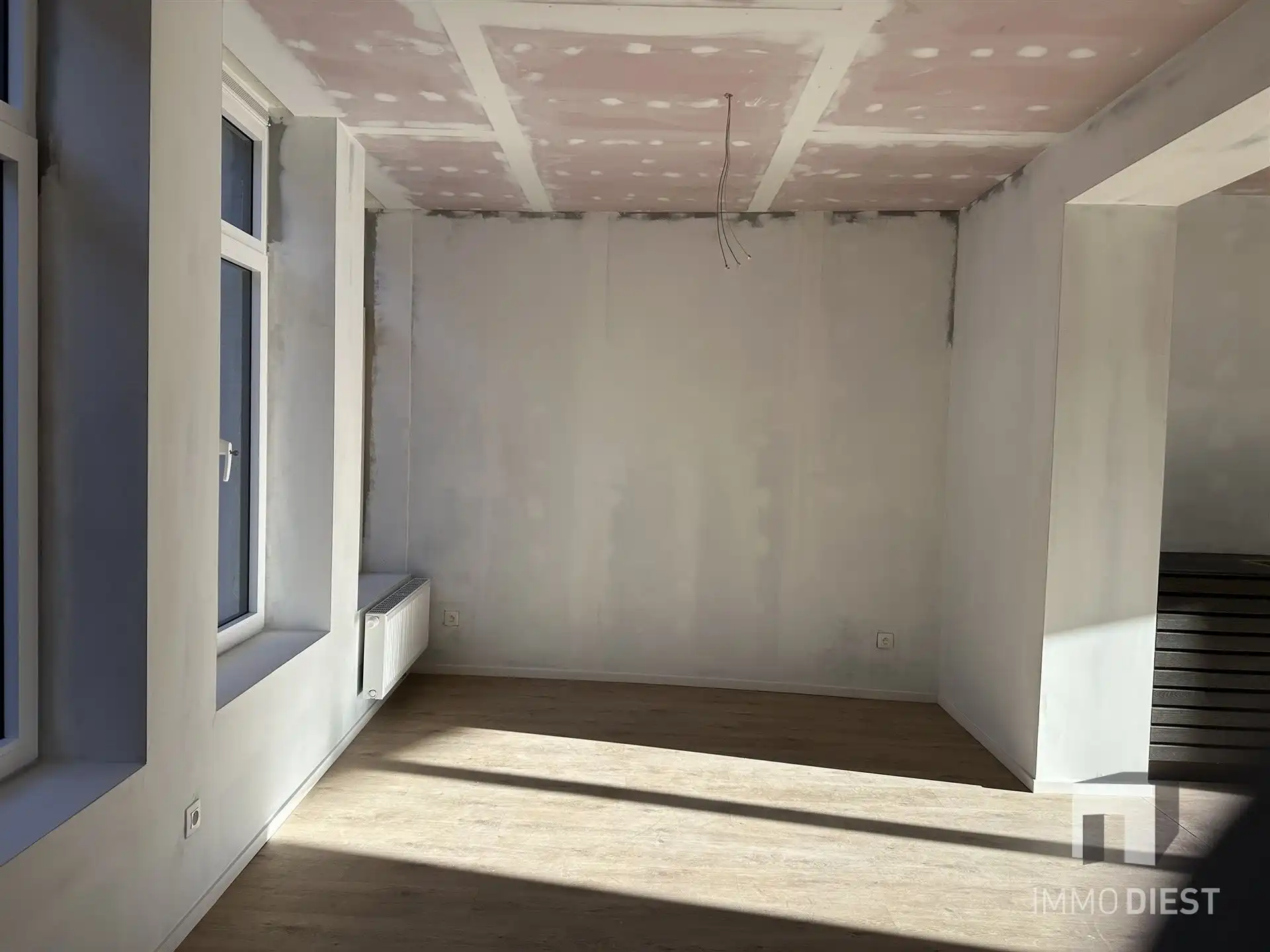 Opbrengsteigendom - 3 gloednieuwe appartementen + 1 handelspand foto 11