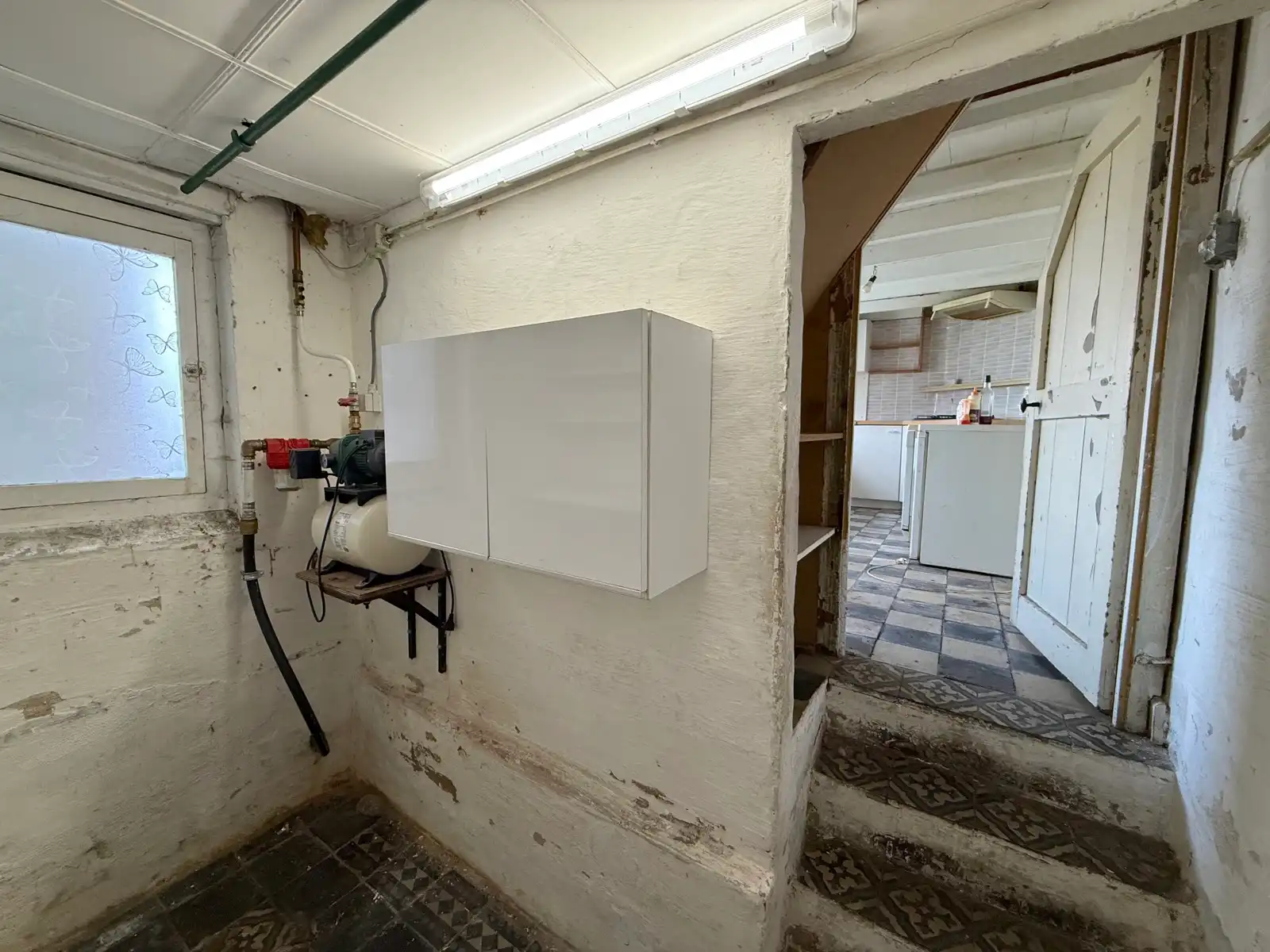 Te renoveren woning met 3 slaapkamers, garage en tuin foto 9