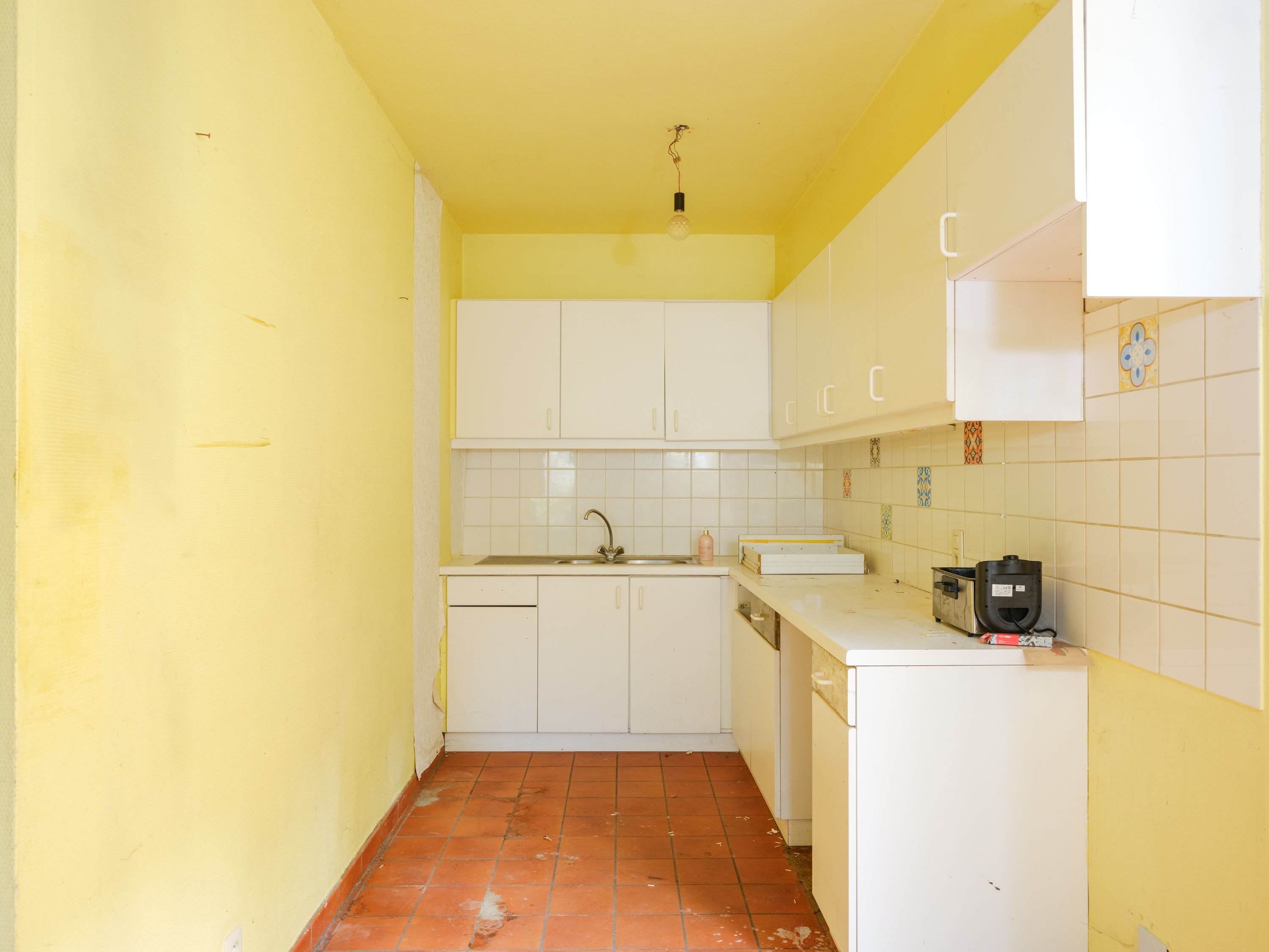 Centraal gelegen stadswoning met 3 slaapkamers en stadstuintje – ideaal renovatieproject foto 5