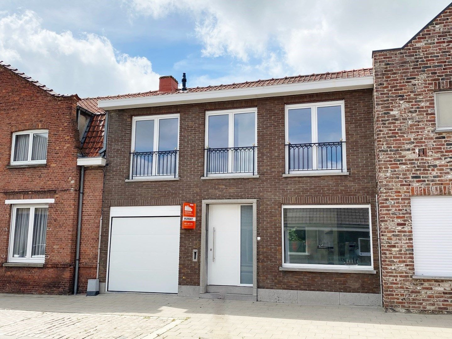 Volledig vernieuwde woning met garage en tuin in de dorpskern. foto 1