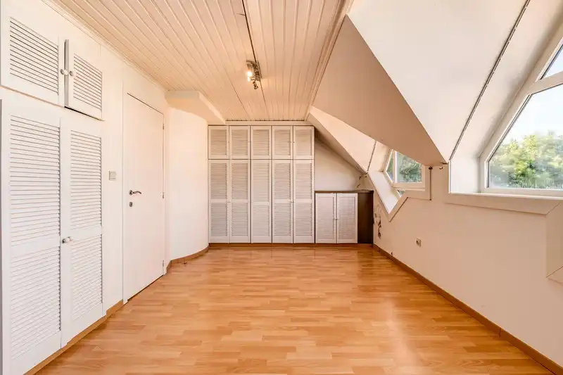 Op te frissen woning met perceel bouwgrond foto 11