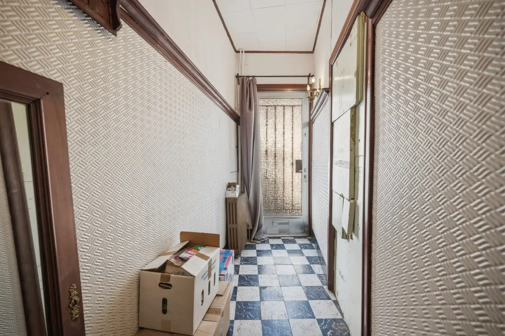 Op te frissen rijwoning op een goede locatie te Tienen foto 4