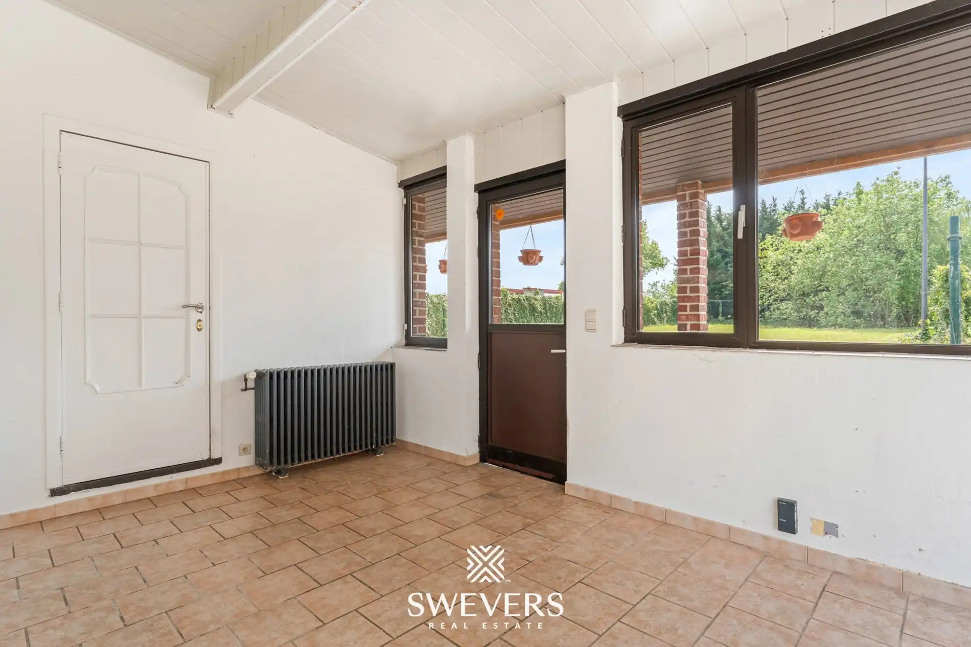 Charmante open bebouwing met 3 slaapkamers, zonnige tuin en renovatiepotentieel foto 12