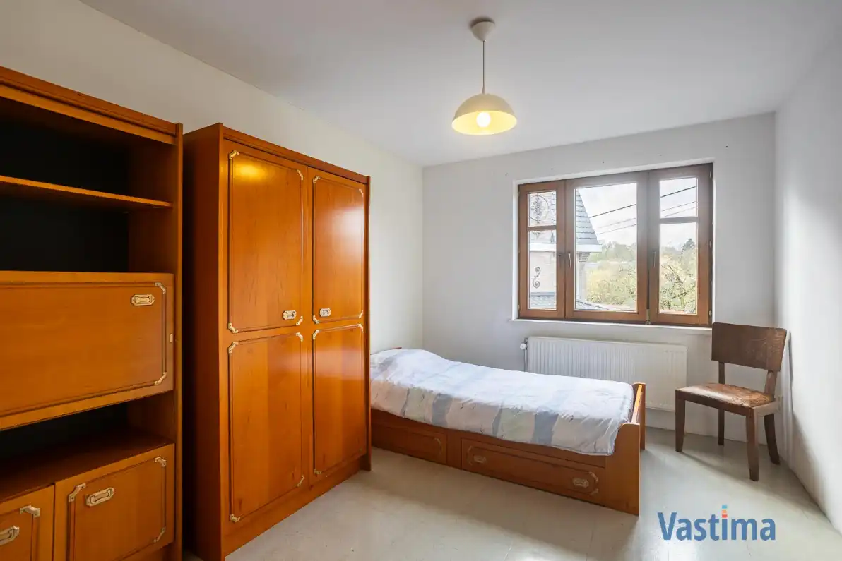 Ruime halfopen gezinswoning met praktijkruimte en tuin foto 21