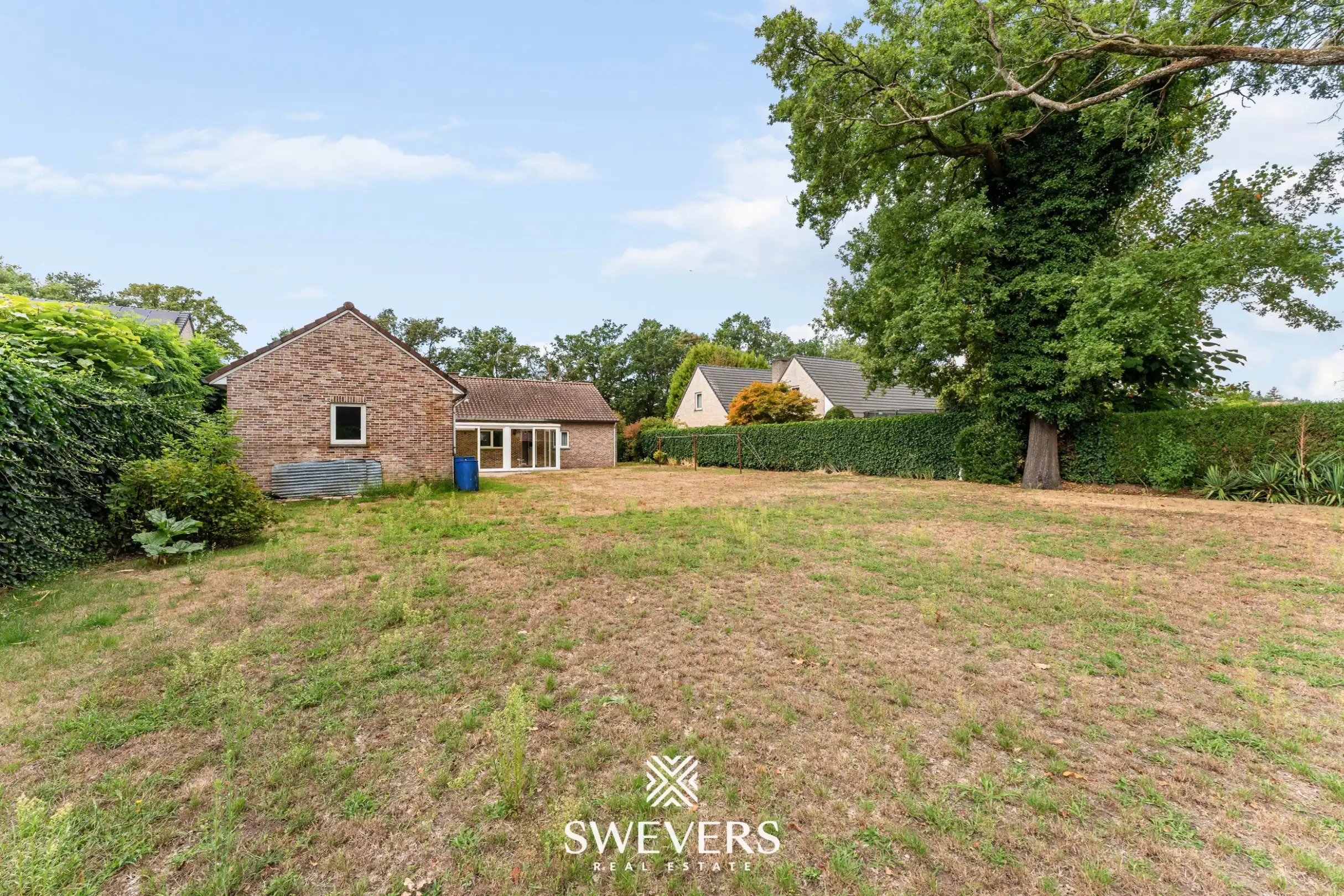 Gelijkvloerse woning met 3 slaapkamers, garage en prachtig groen perceel vlak bij Zolder-Centrum foto 30