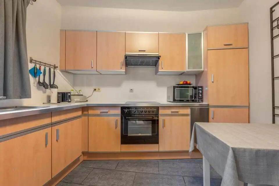 INSTAPKLARE HALFOPEN BEBOUWING MET ZONNEPANELEN EN TERRAS IN TONGEREN foto 8