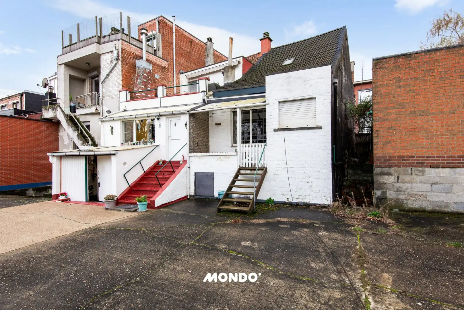 Te renoveren woning met tuin en garage op rustige ligging in Boom foto 2