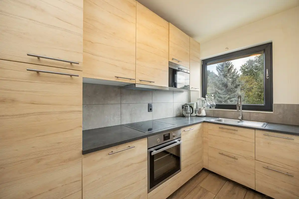 Ruim en instapklaar appartement met 3 slaapkamers, terras en autostaanplaats nabij het centrum van Wommelgem foto 7