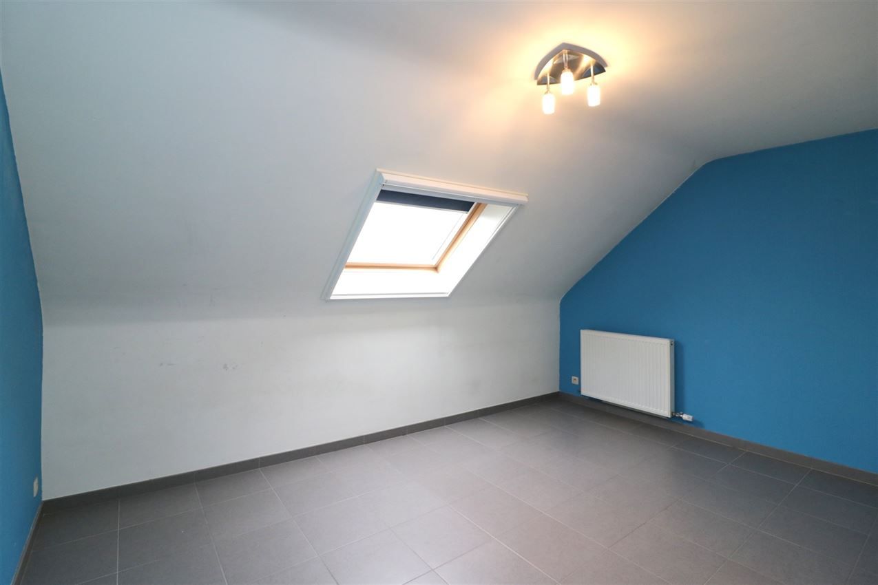 Duplex-appartement met 2 slpk., terras, autostaanplaats in centrum foto 22