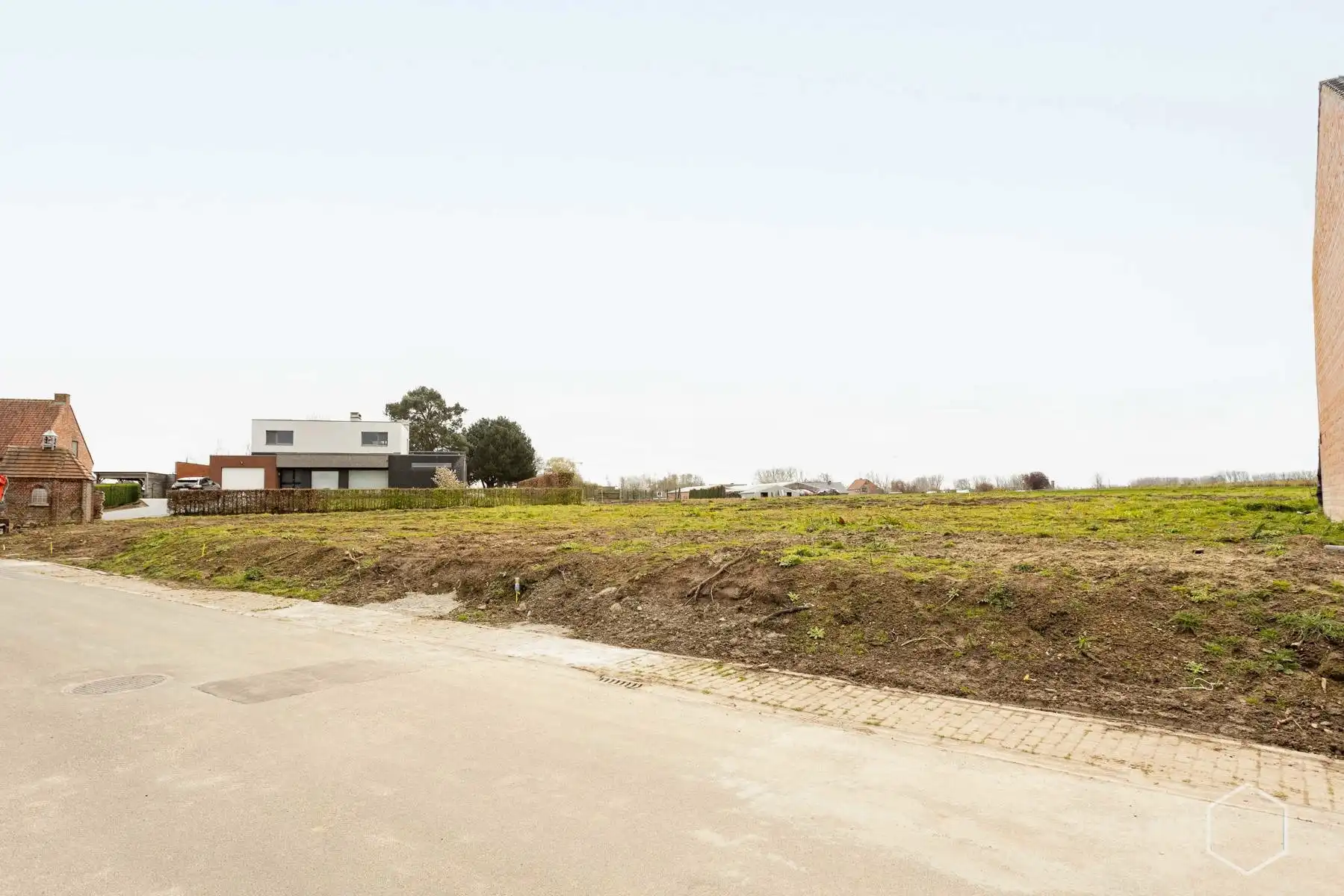 Bouwgrond HOB in een rustige straat met gunstig uitzicht foto {{pictureIndex}}