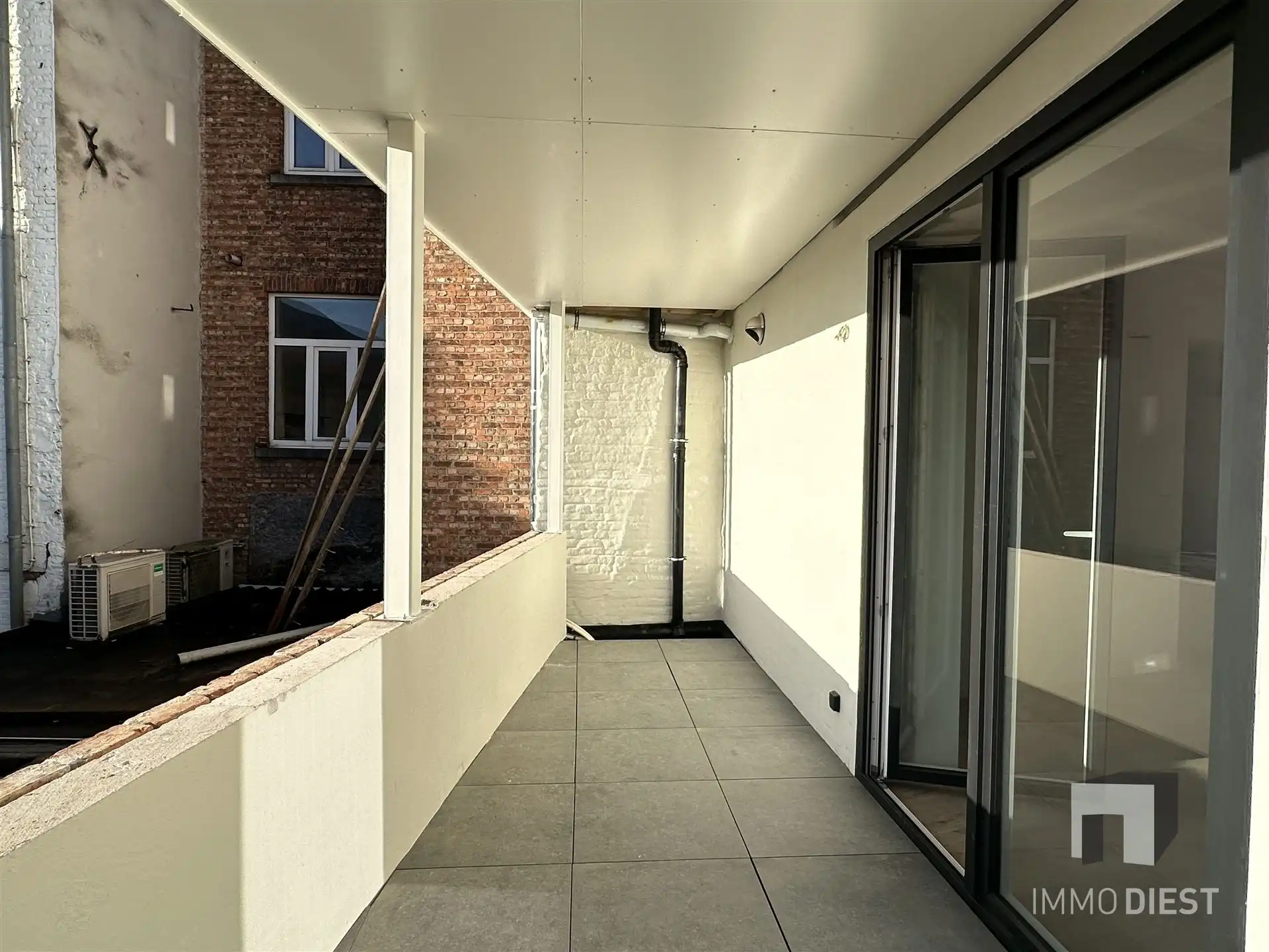 Opbrengsteigendom - 3 gloednieuwe appartementen + 1 handelspand foto 7