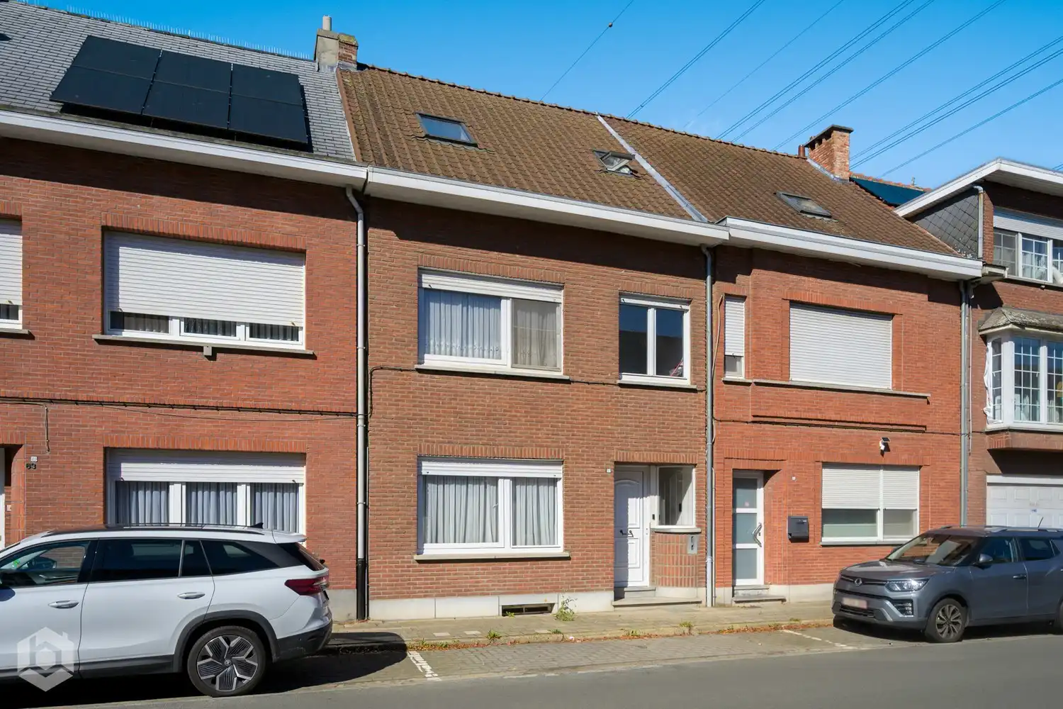 Instapklare woning met 4 slpkrs en ruime tuin te Niel foto {{pictureIndex}}