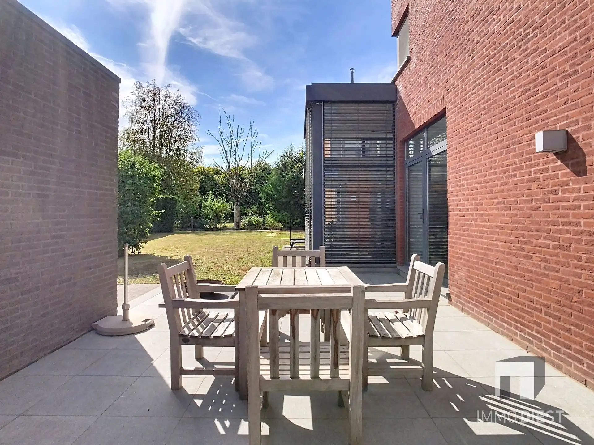 Moderne, lichtrijke woning met aangename tuin aan de voet van hartje Scherpenheuvel. foto 29