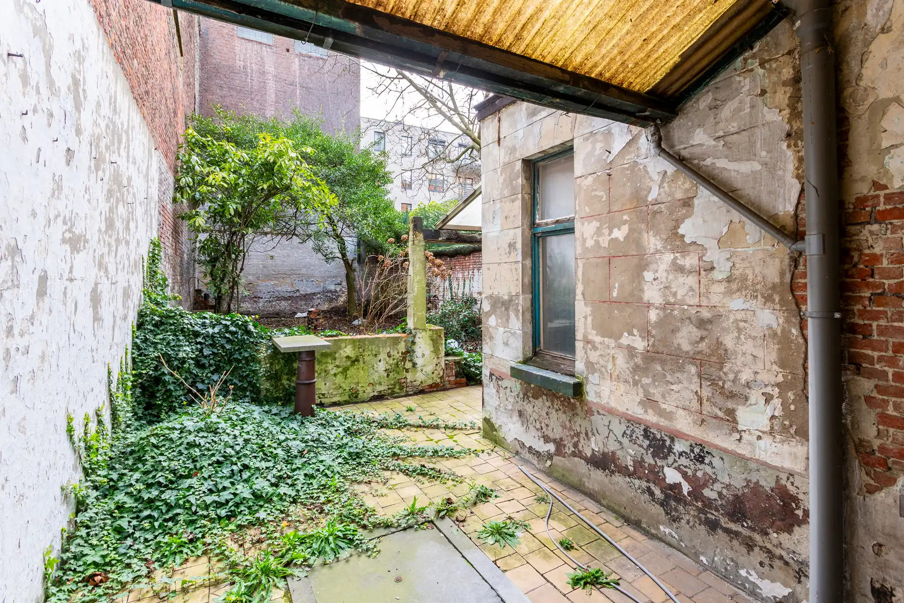 Te renoveren herenwoning nabij het KMSKA foto 7