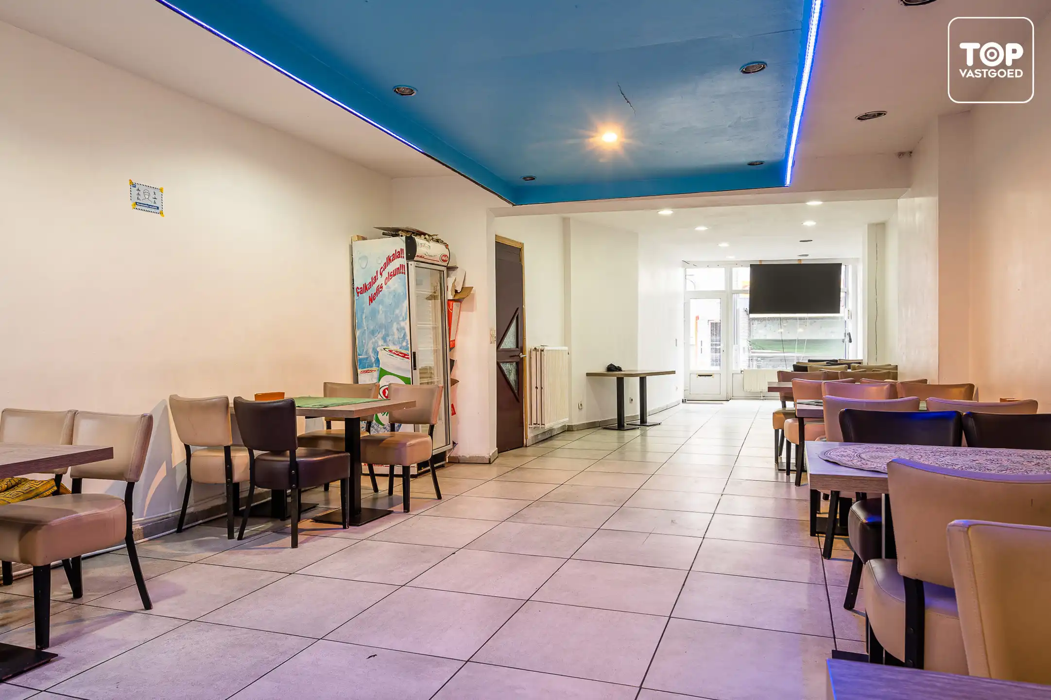 DISCREET Centraal gelegen (opbrengst) eigendom met verhuurd handelsgelijkvloers en 2-slaapkamer woonst foto 4