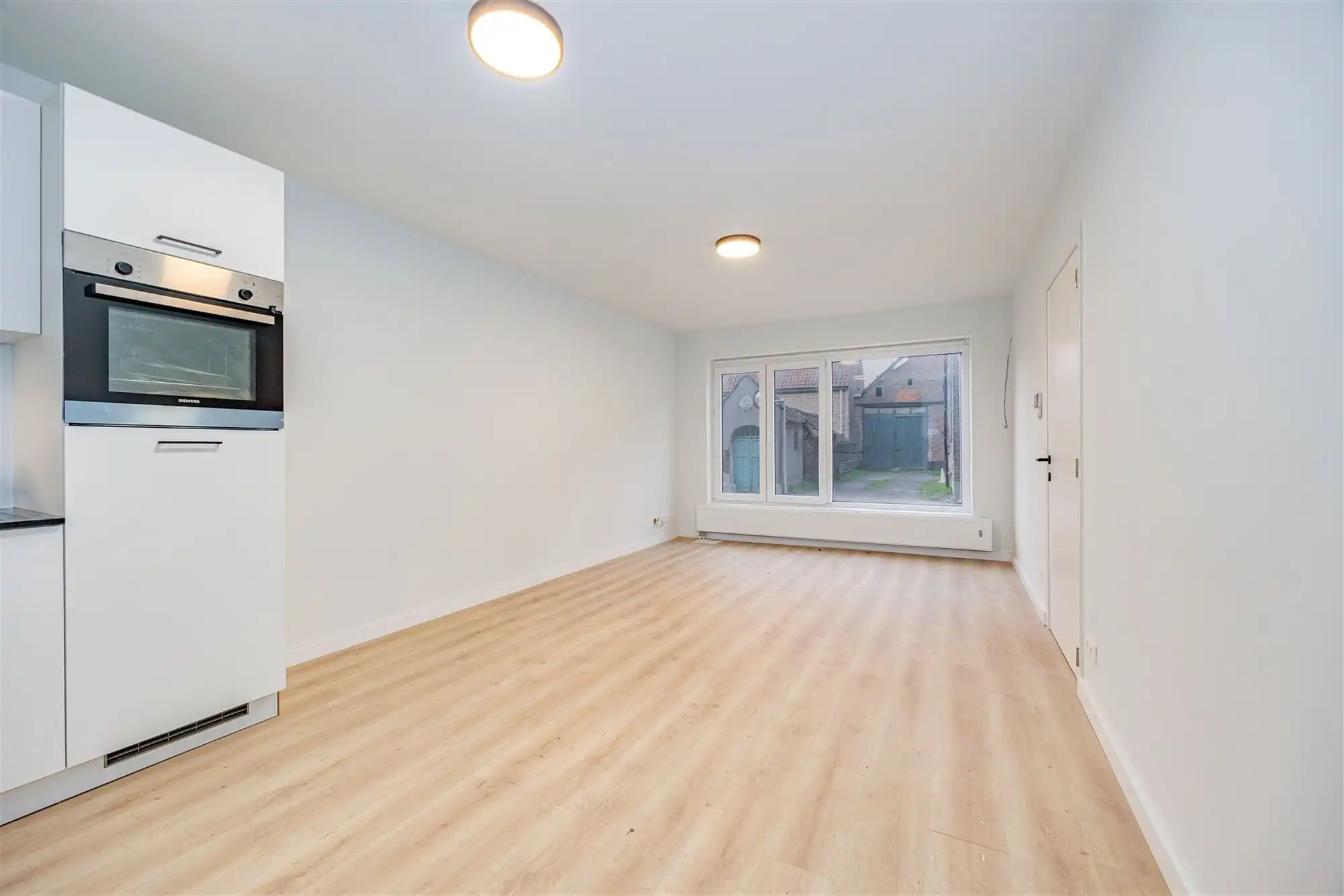 Gelijkvloers instapklaar appartement met tuin foto 3