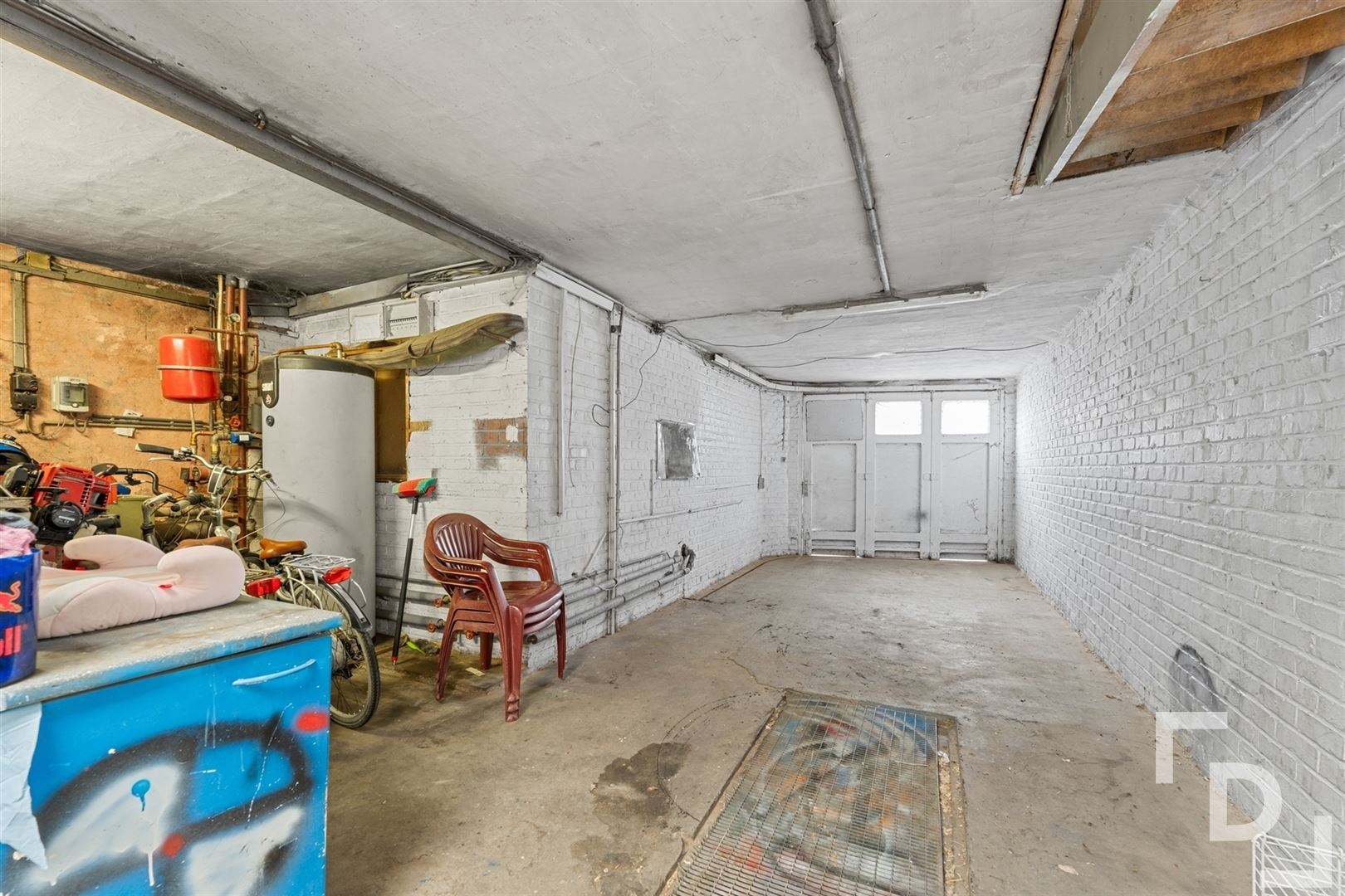 Gezinswoning met ruime tuin in hartje Krombeke! foto 16