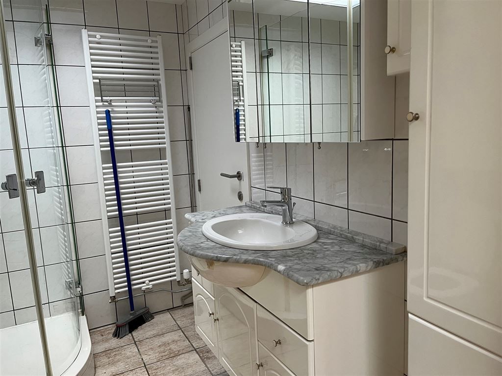 Gezellig en instapklaar triplex appartement met 2 slaapkamers in het centrum van Opoeteren foto 8