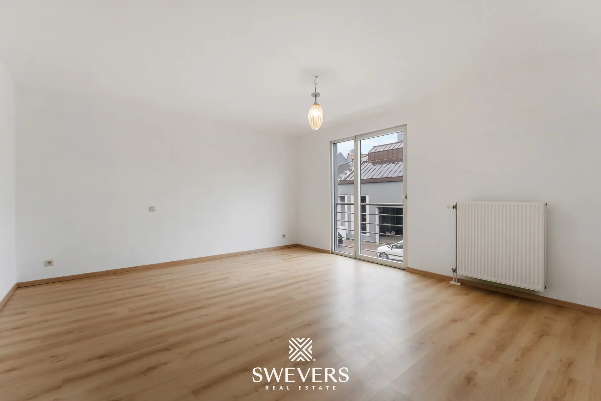 Ruim duplex appartement met 2 slaapkamers en tuin foto 10