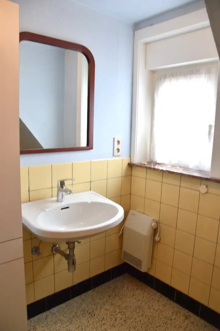 Halfopen bebouwing met 3 slaapkamers en zonnige tuin te koop in Bellegem foto 6