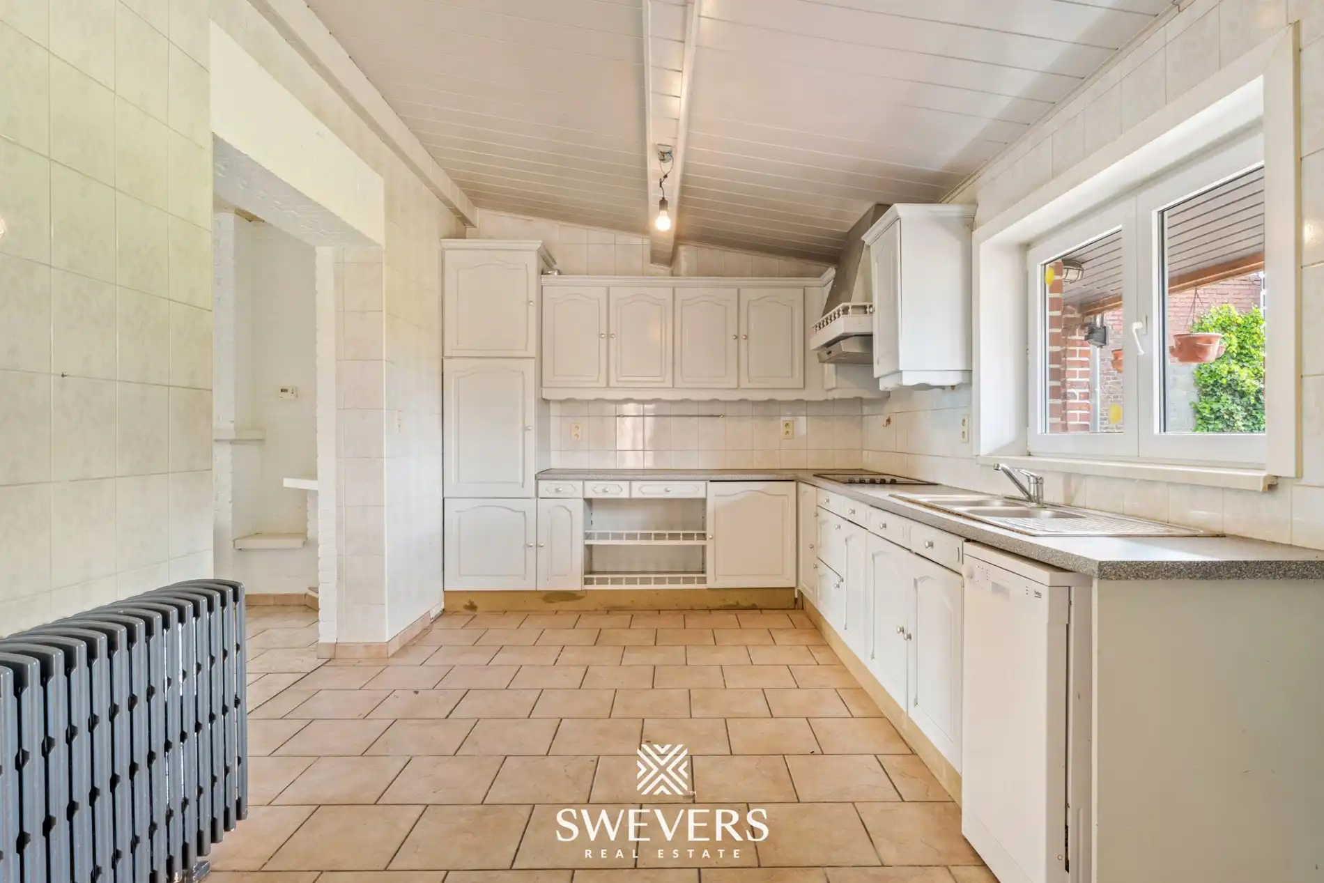 Charmante open bebouwing met 3 slaapkamers, zonnige tuin en renovatiepotentieel foto 8