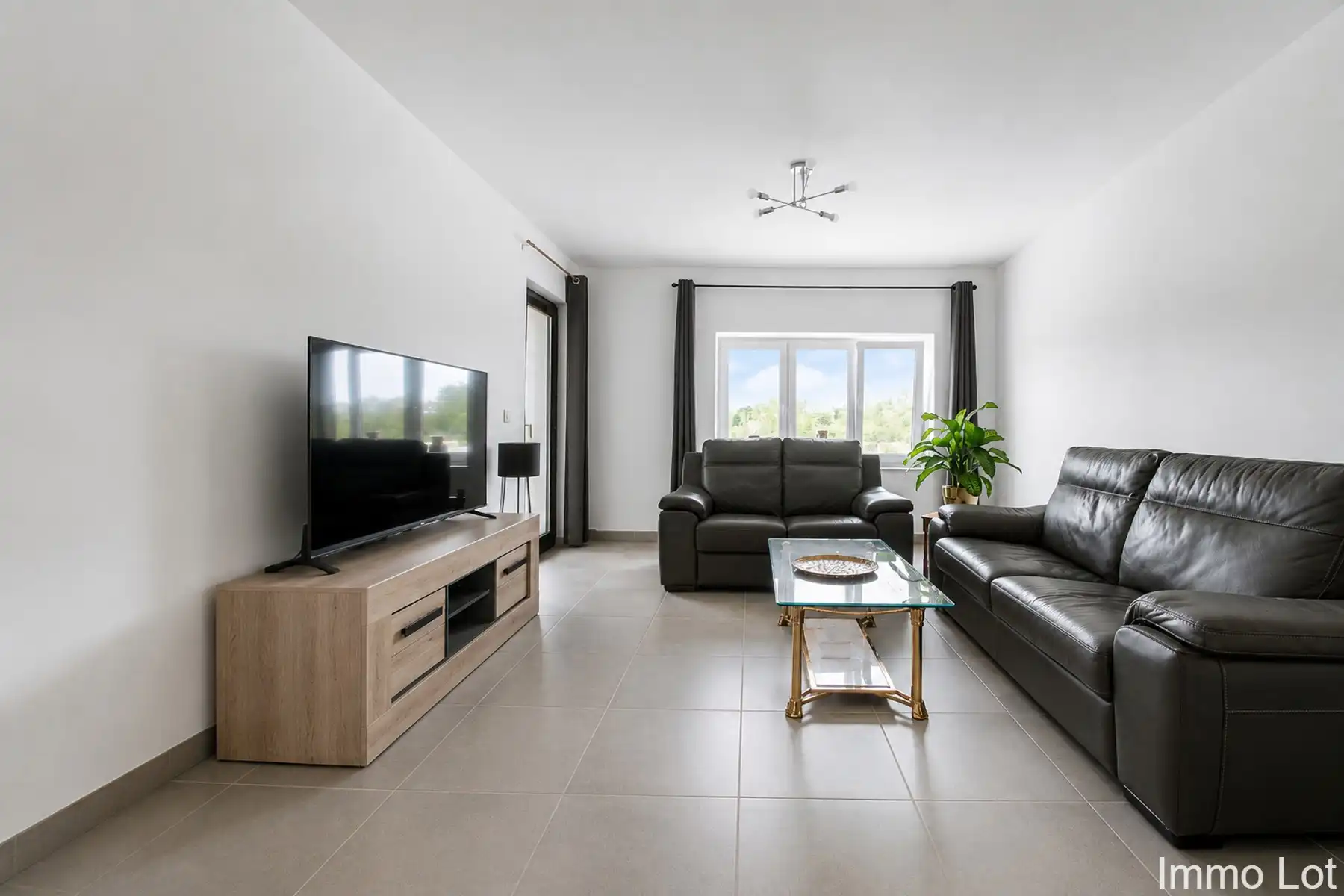 duplex met terras, 2 slaapkamers en autostaanplaats foto 2