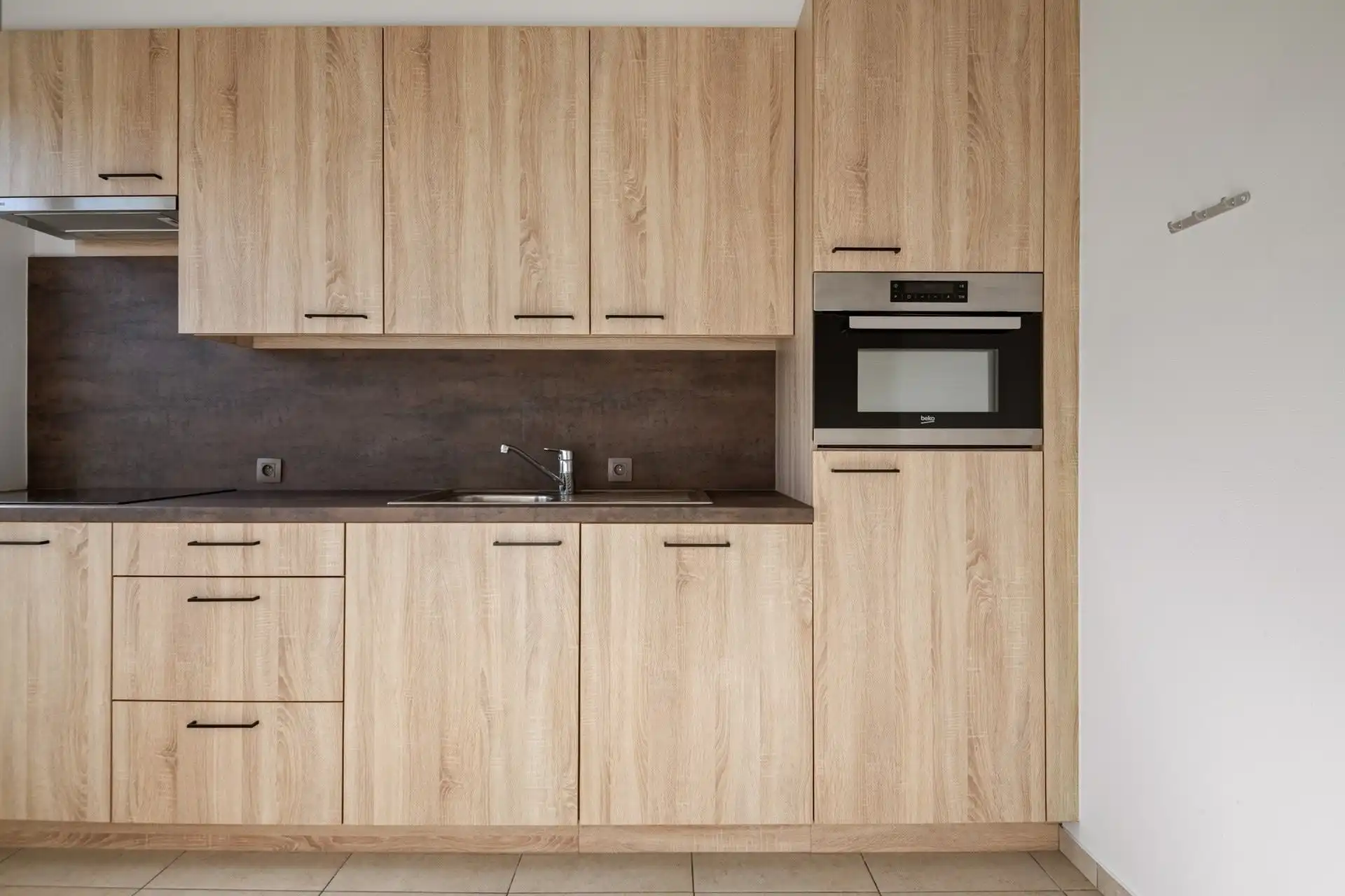 Centraal gelegen en instapklaar appartement met garagebox. foto 4