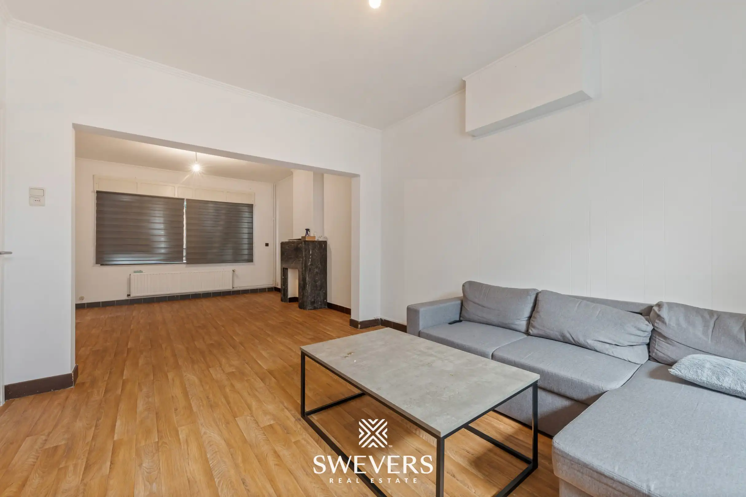 Te renoveren woning met 4 slaapkamers en 4 garages te Beringen foto 3