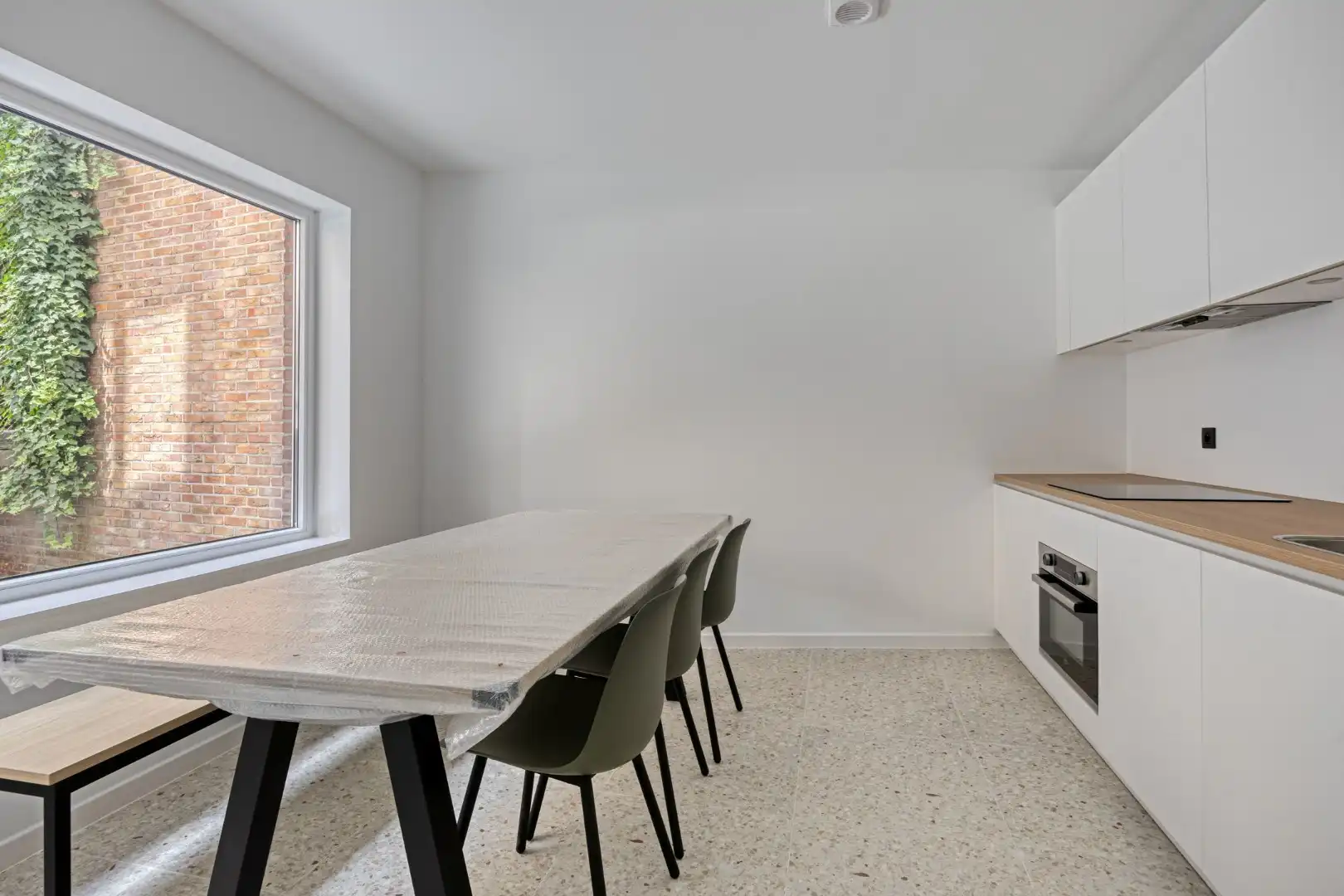 Volledig gerenoveerde studentenkamer in residentie met 29 studentenkamers met eigen sanitair en terras in hartje Leuven - EPC label A! foto 8