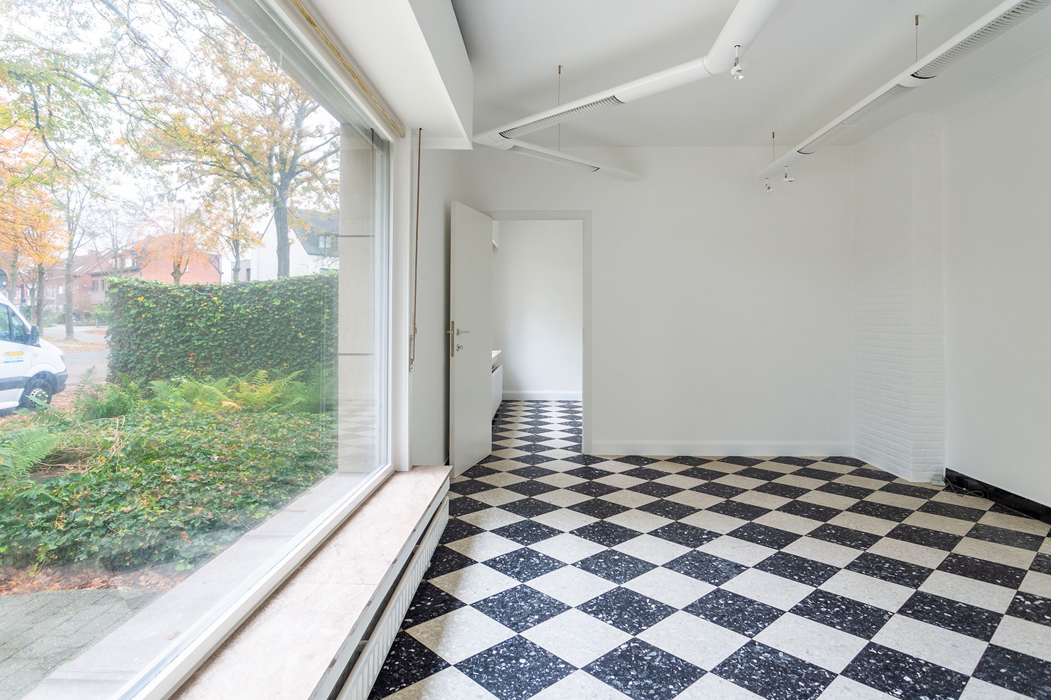 Opbrengsteigendom met 2 appartementen en 2 garageboxen foto 8