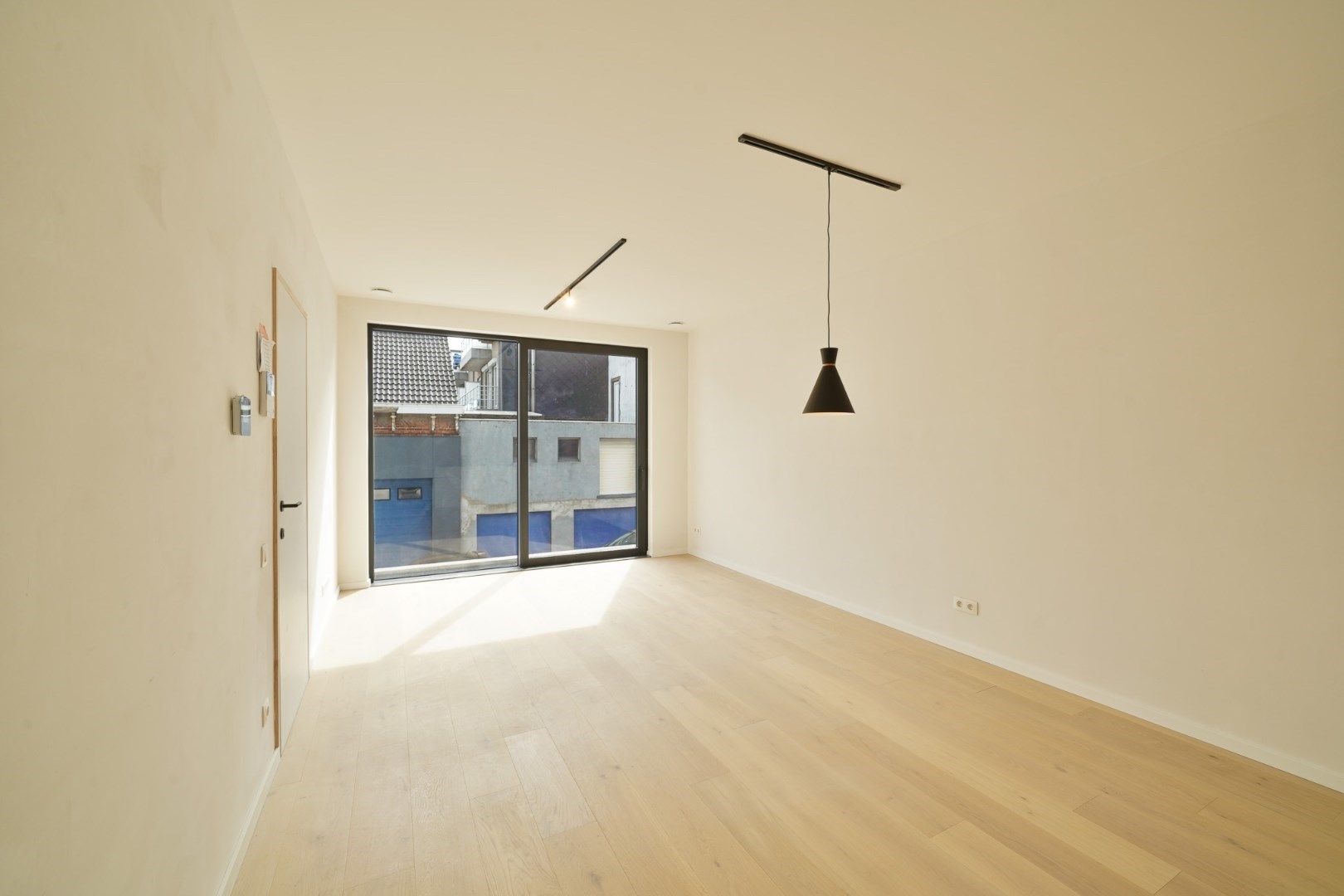 Nieuw 1-slaapkamerappartement met parking! foto 4
