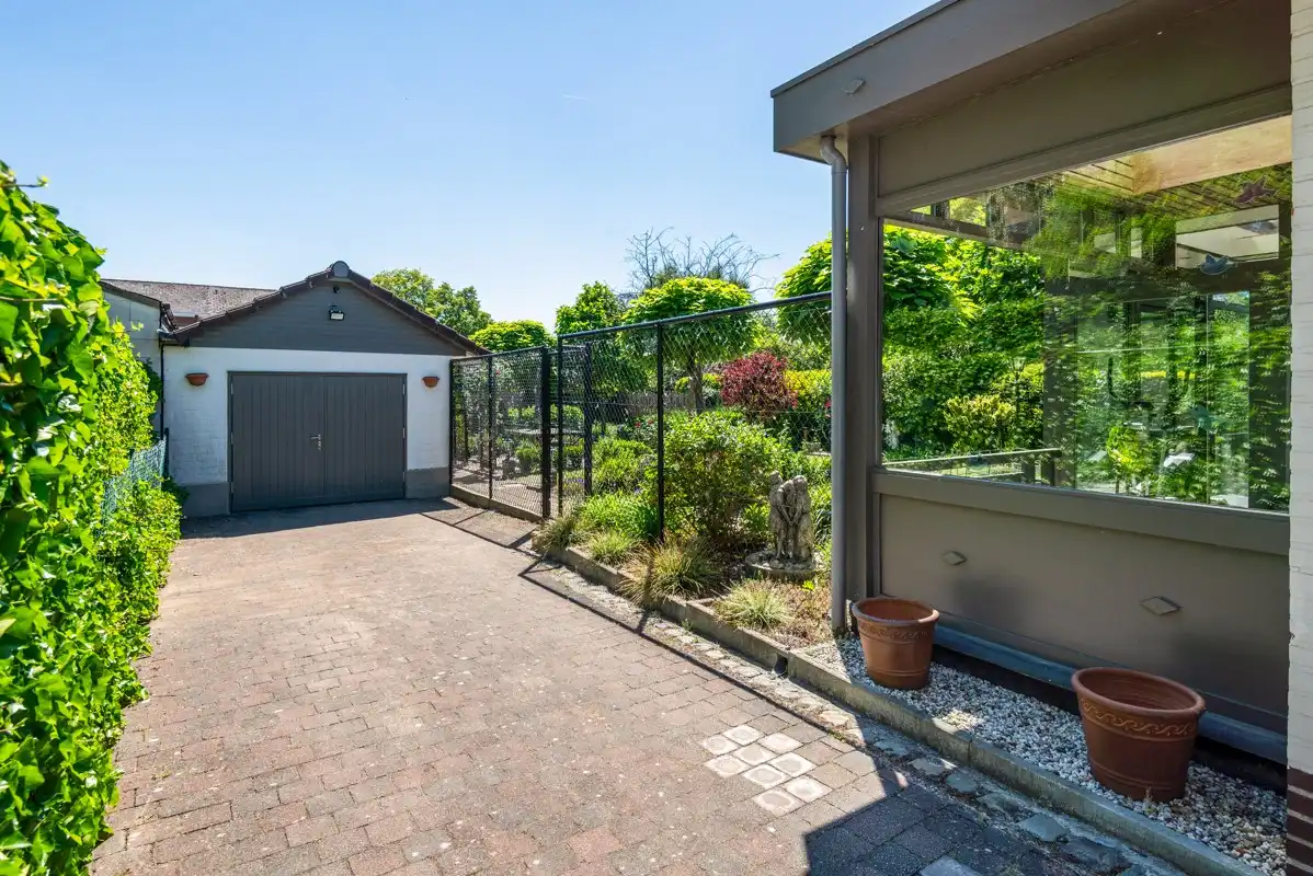 Gelijkvloerswoning met 3 - 4 slaapkamers, garage & prachtig omheinde tuin. foto 19