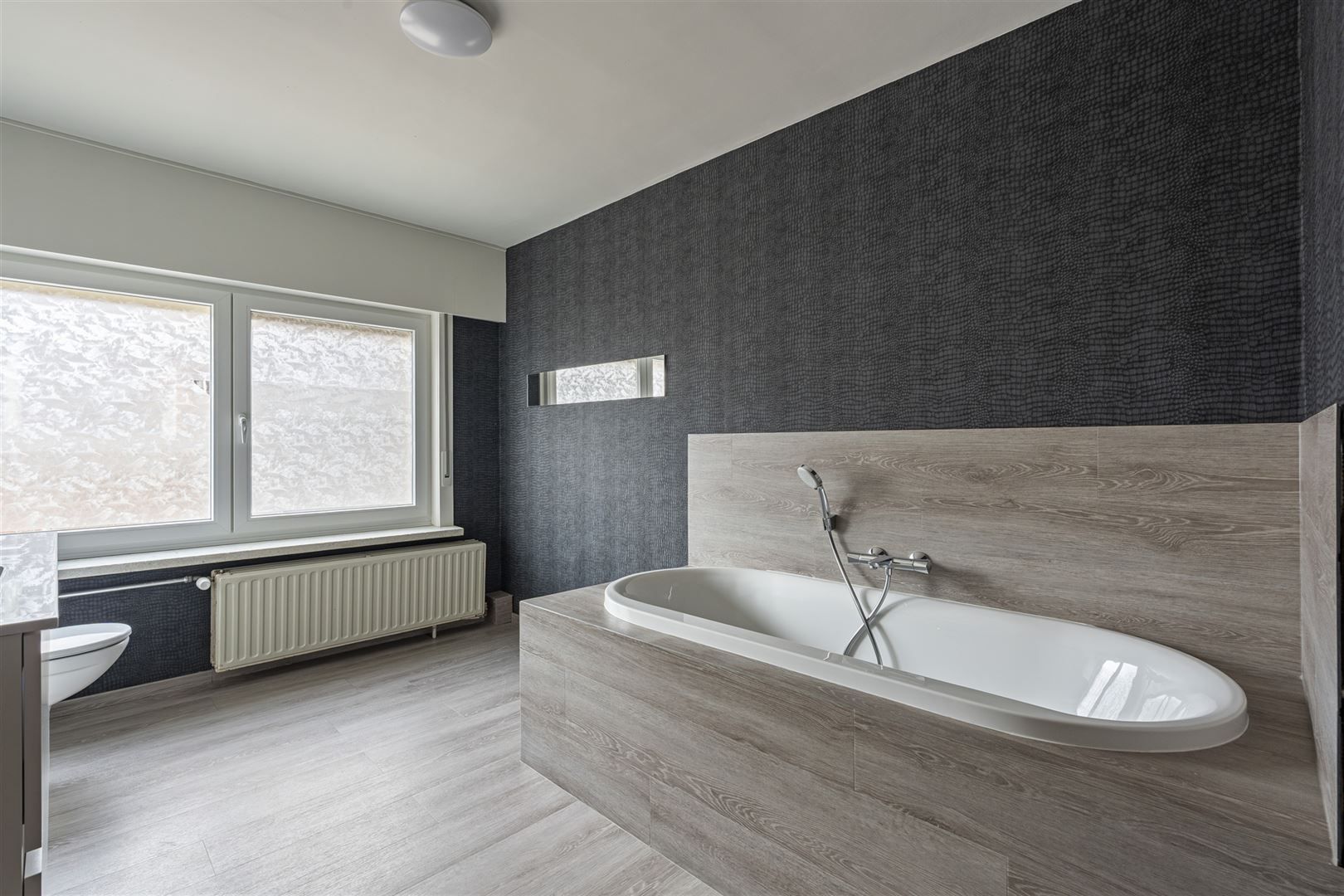Zeer ruime woning met prachtige tuin foto 18