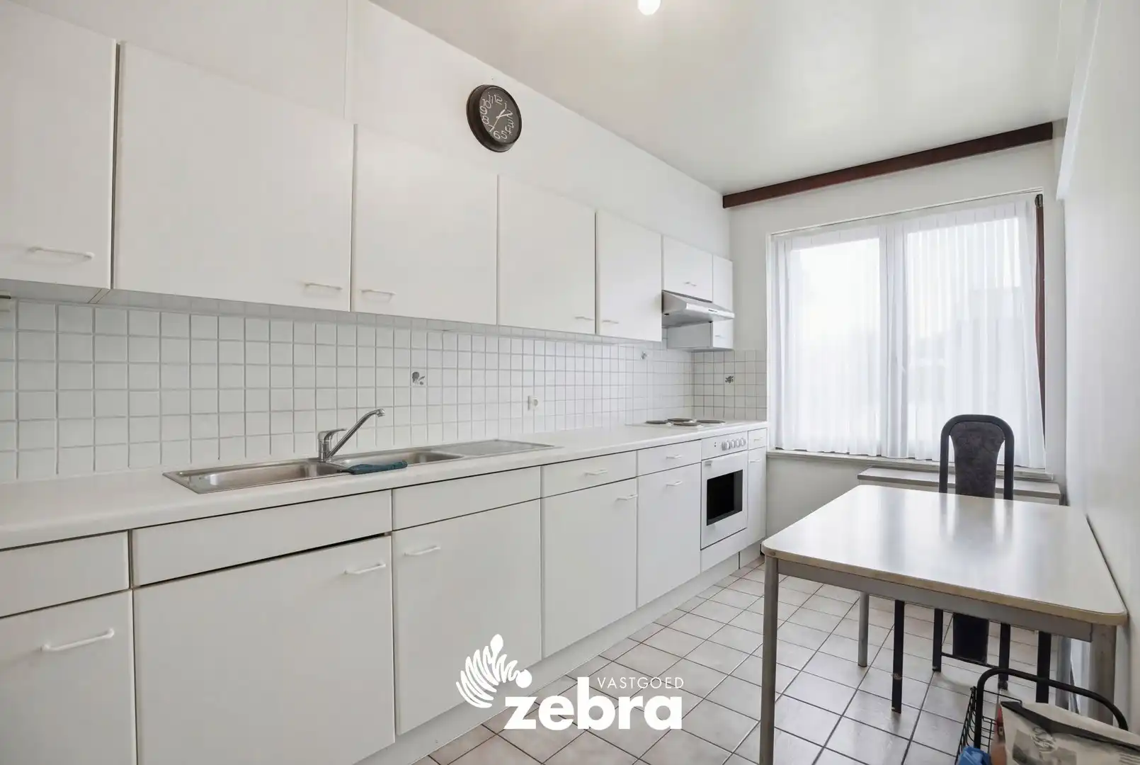 Gelijkvloers 2-slaapkamerappartement met terras en garage in centrum Tielt! foto 7