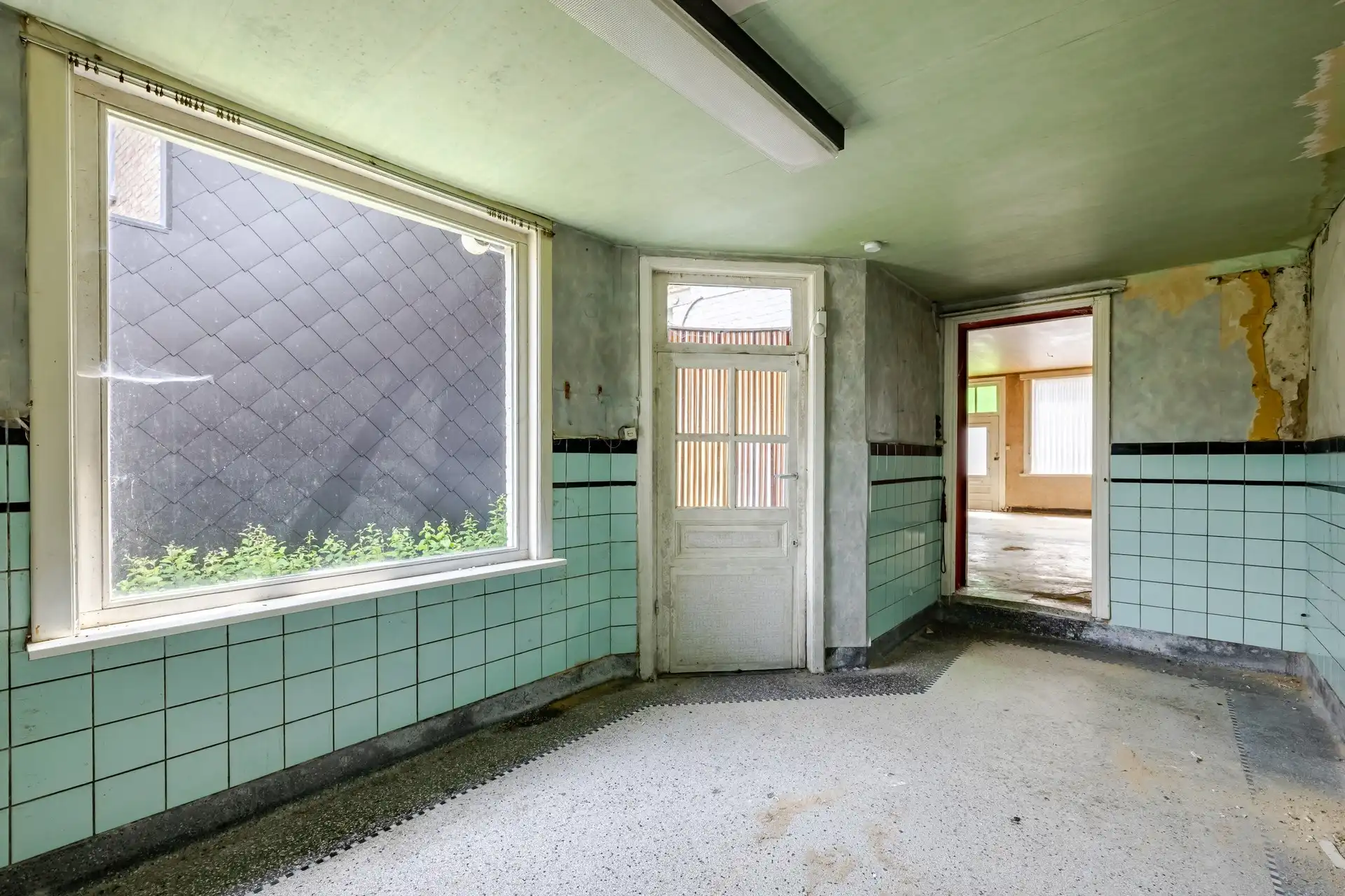 Te renoveren woning met grote tuin en garage te Haaltert foto 10
