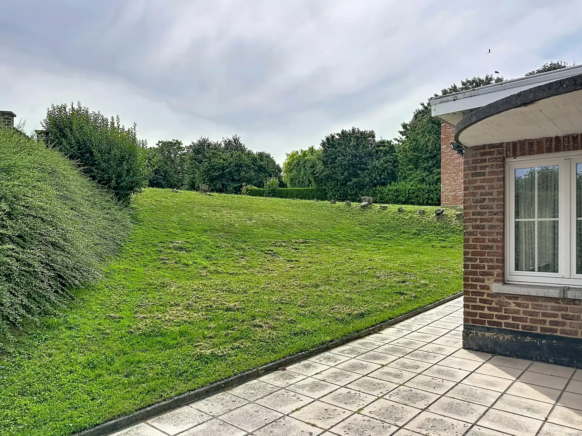 Stevige viergevel met Z-gerichte tuin en werkplaats foto 7