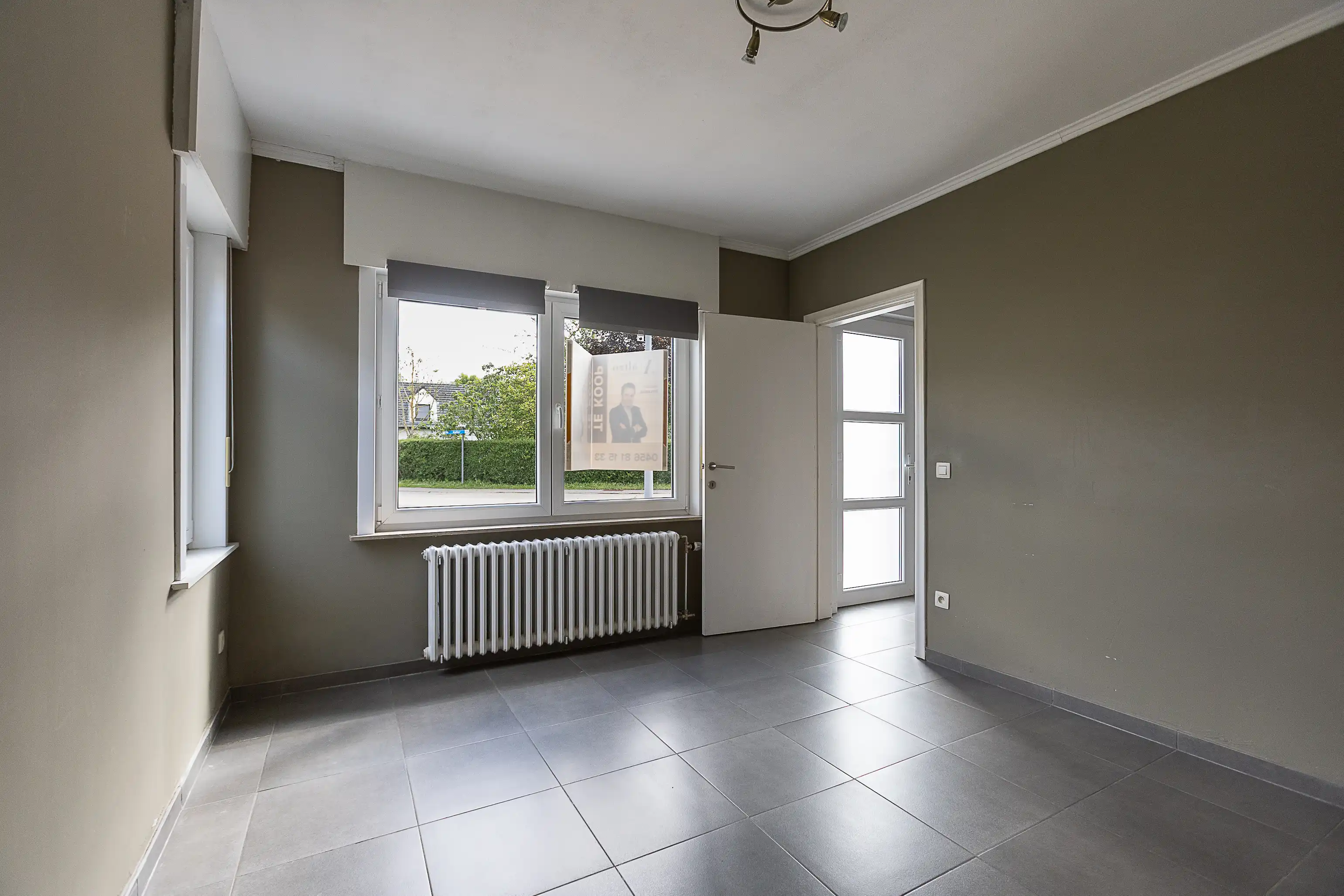 Charmant en verrassend ruim huis te koop in Aalter foto 2