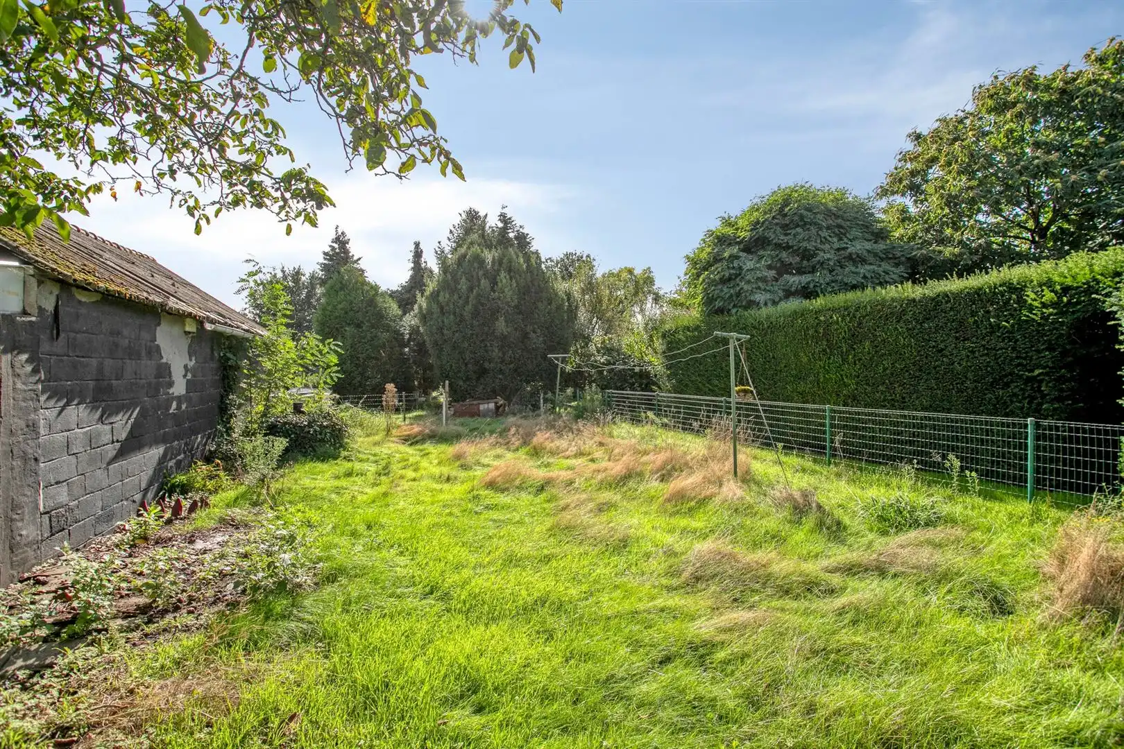 Rustig gelegen, te renoveren open bebouwing met grote zonnige tuin. foto 19