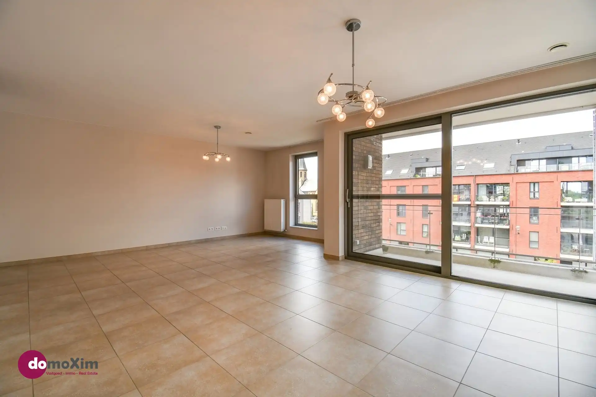 Instapklaar 3-slaapkamer appartement met parking in hartje Boortmeerbeek foto 9