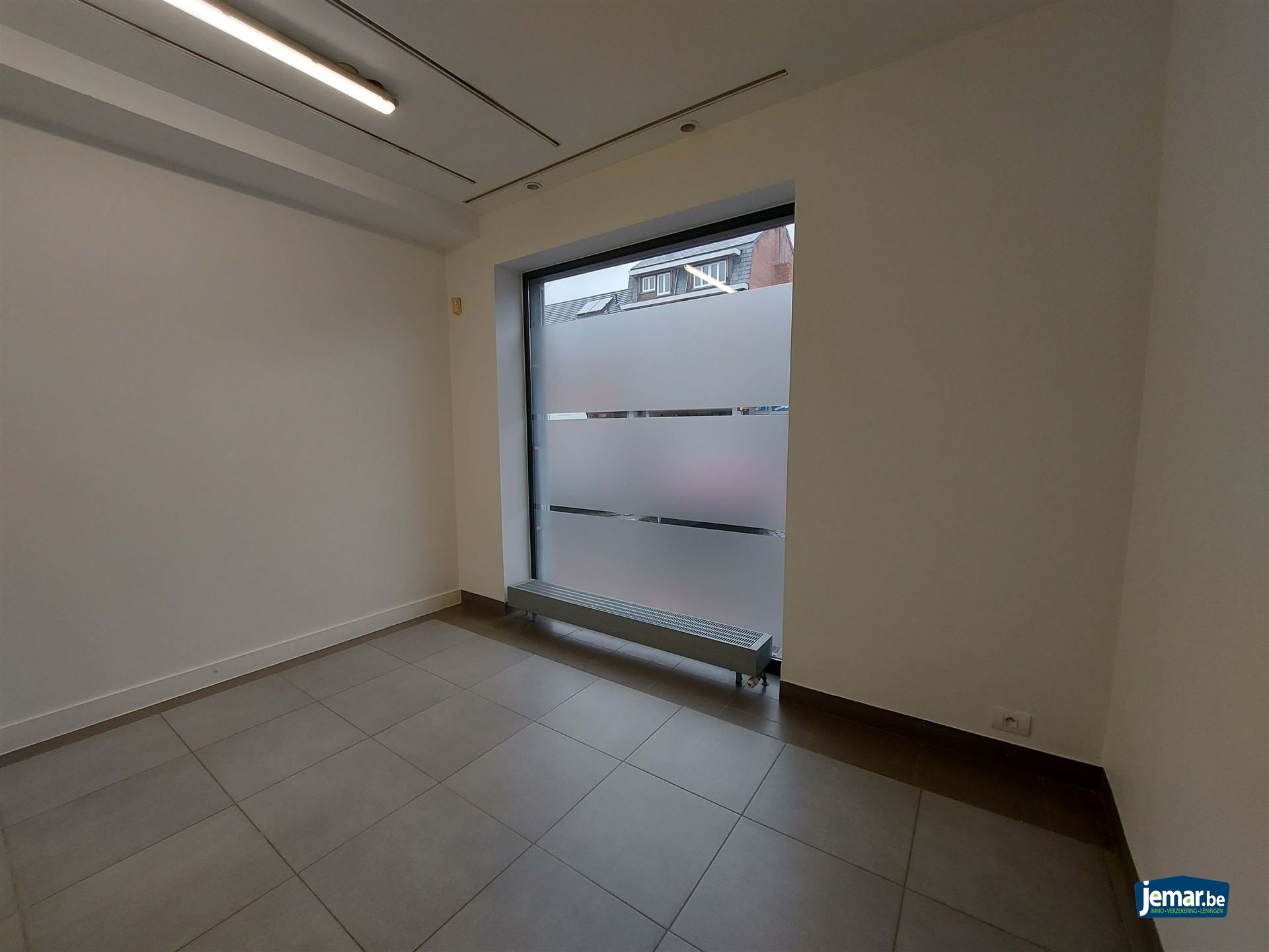 AANDELENOVERDRACHT: Handelspand met appartement foto 16