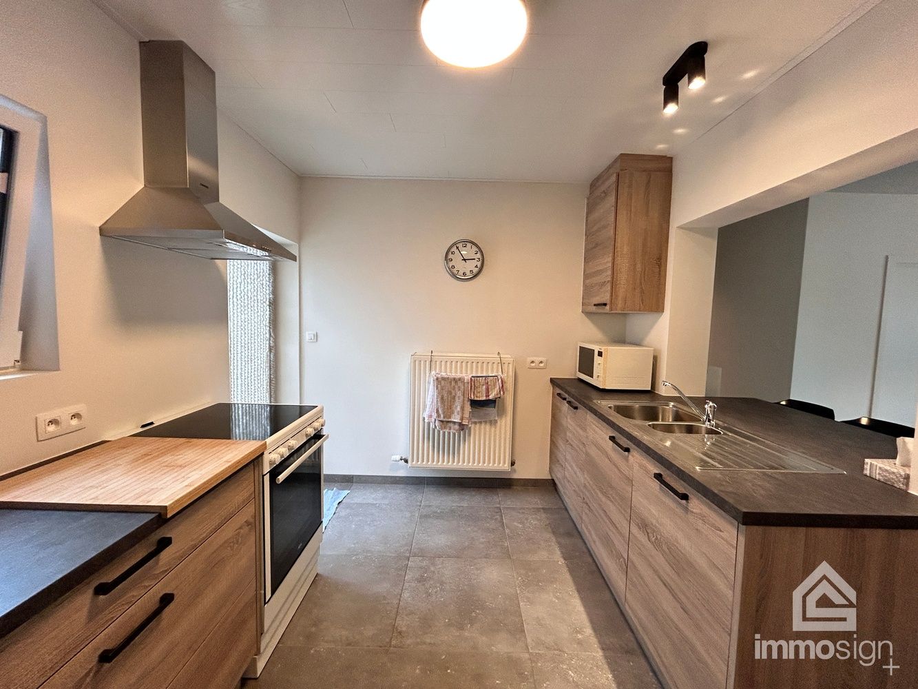 Volledig gerenoveerde gelijkvloerse éénslaapkamerwoning te Reppel! foto 12