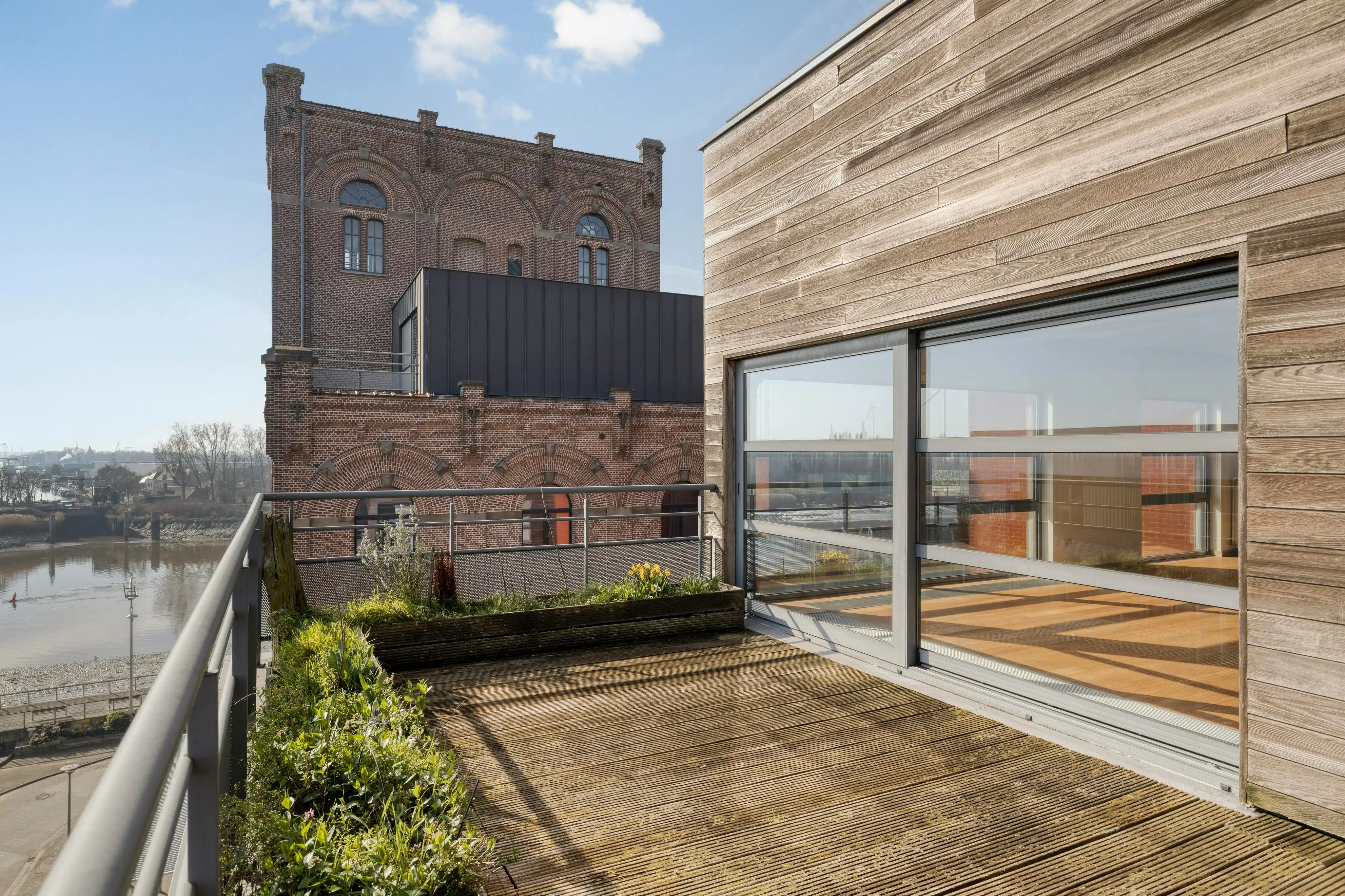 Instapklaar dakappartement met zicht op het water in Boom foto 8