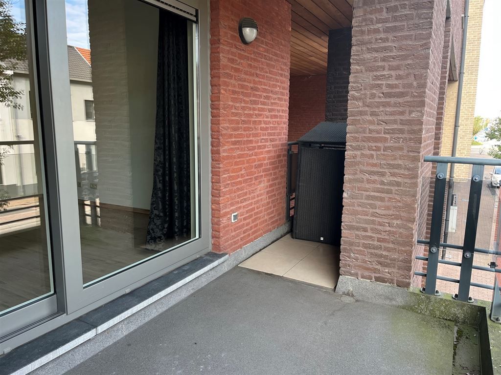 Hedendaags appartement met 2 slaapkamers, een terras en een parkeerplaats, gelegen in het centrum van Maaseik foto 14