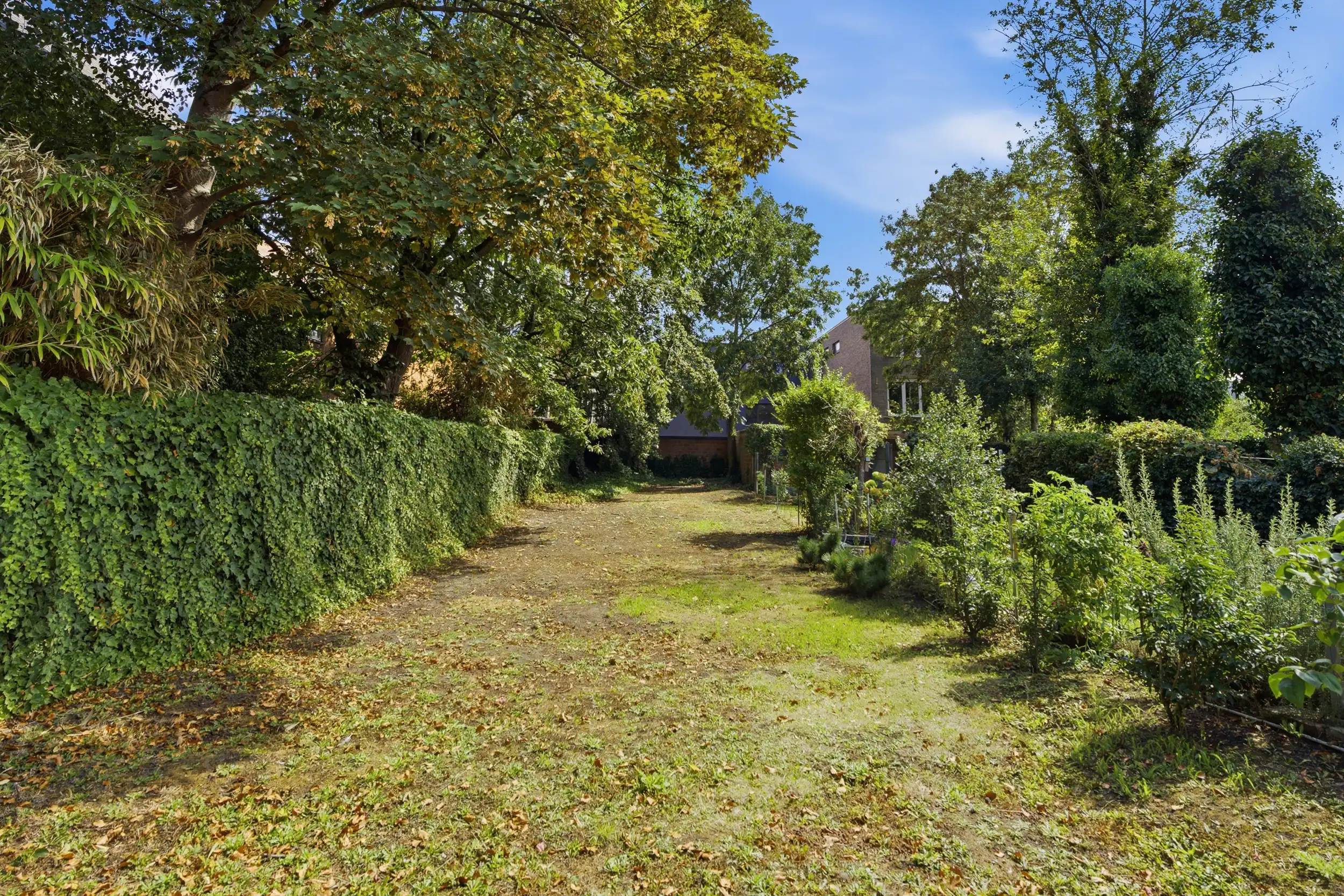 Uniek handelspand met duplex app. en tuin in hartje Wetteren foto 23