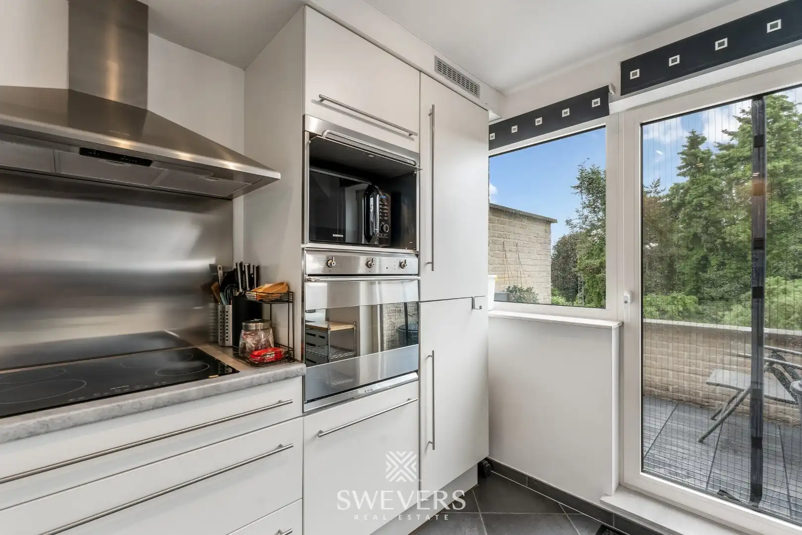 Ruim duplex appartement met 2 slaapkamers en garage foto 19