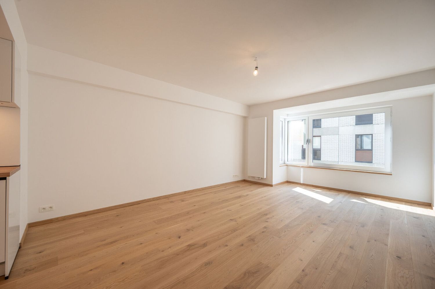 Instapklaar 2-slaapkamerappartement met zijdelings zeezicht te Heist foto 5