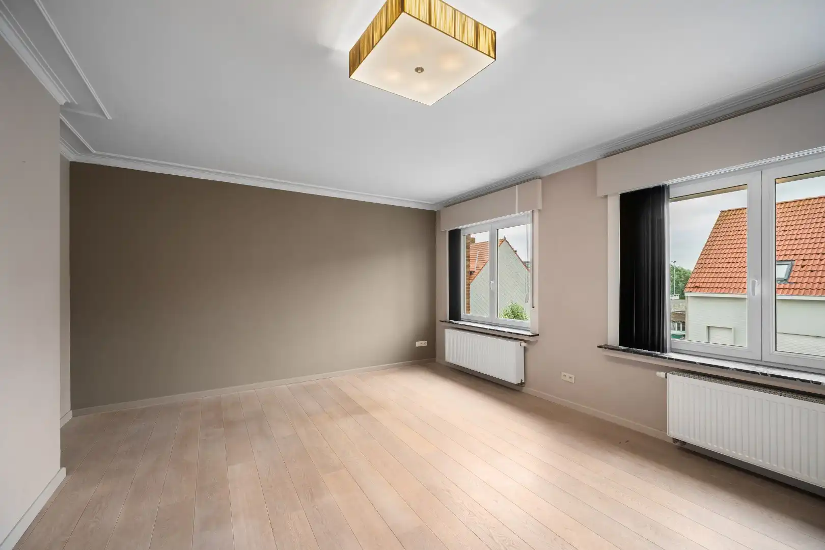Instapklaar en lichtrijk appartement met terras in het centrum van Heist. foto 3